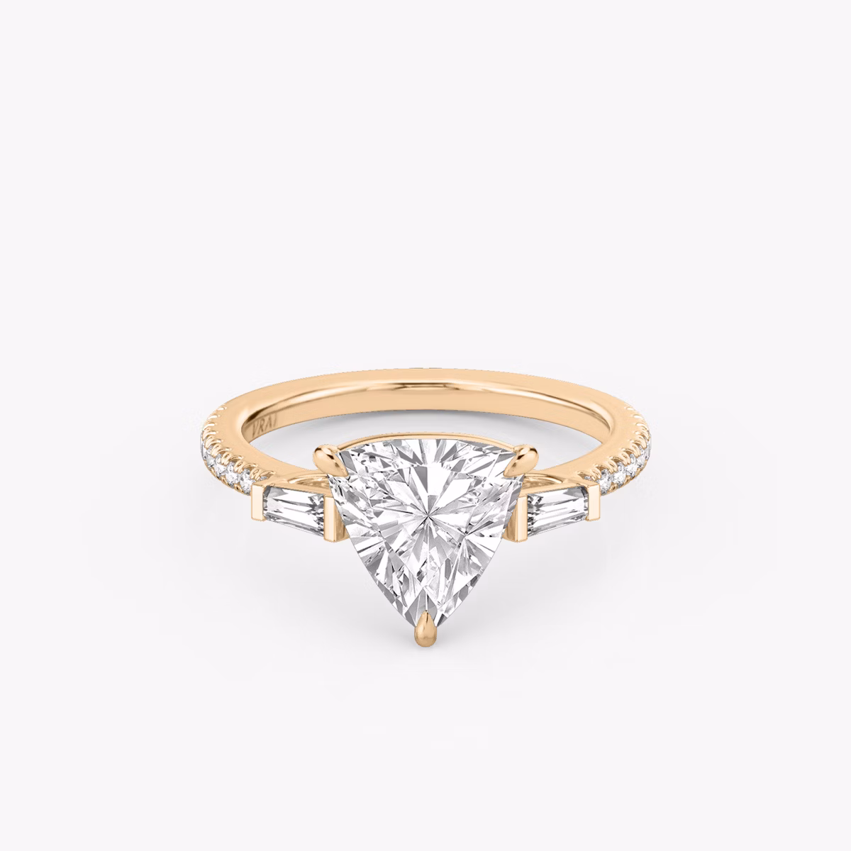 The Three Stone | Trillion | 14k | Rose Gold | bandAccent: Pavé | sideStoneCarat: 0.10ct | sideStoneShape: Tapered Baguette | diamondOrientation: vertical | caratWeight: other