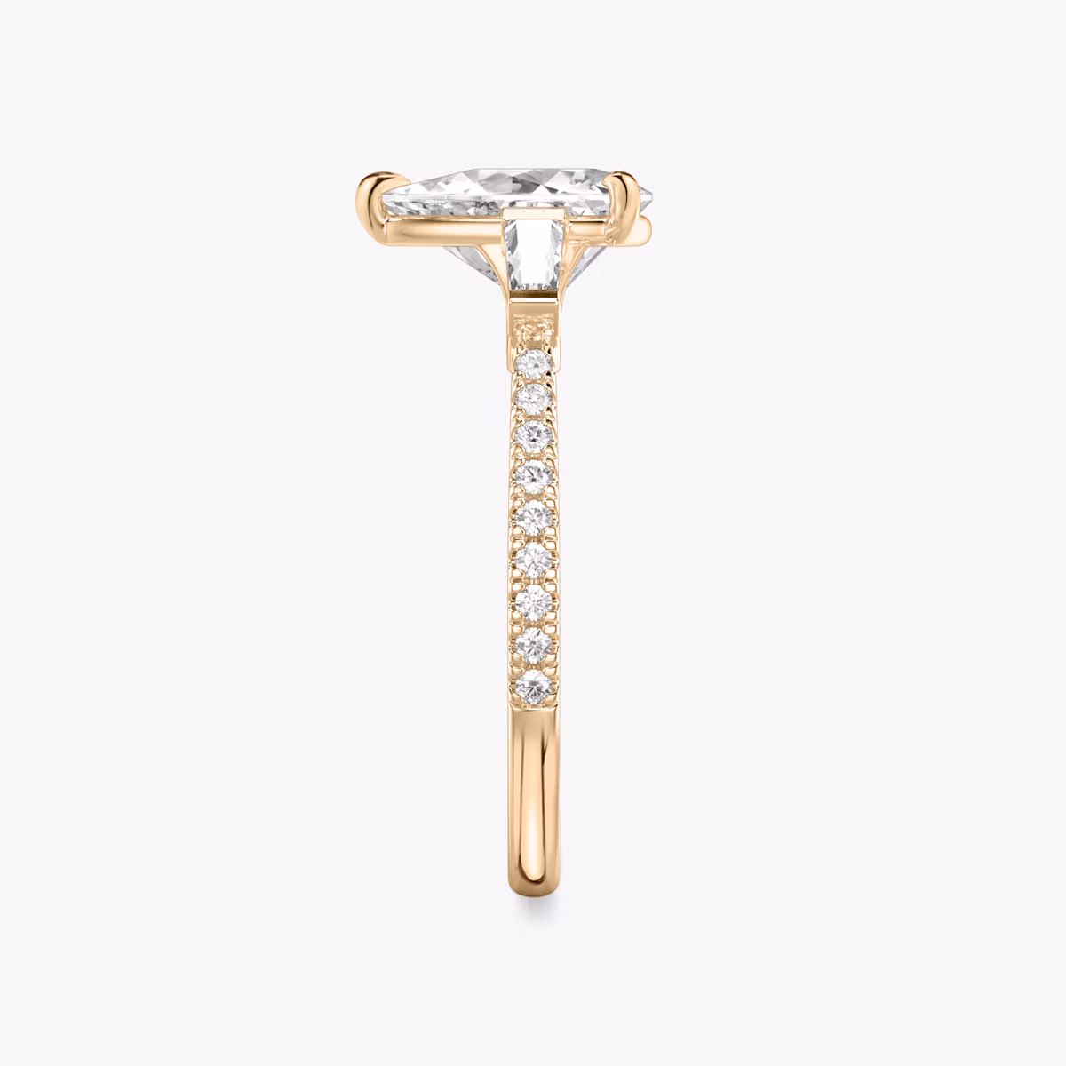 The Three Stone | Trillion | 14k | Rose Gold | bandAccent: Pavé | sideStoneCarat: 0.10ct | sideStoneShape: Tapered Baguette | diamondOrientation: vertical | caratWeight: other