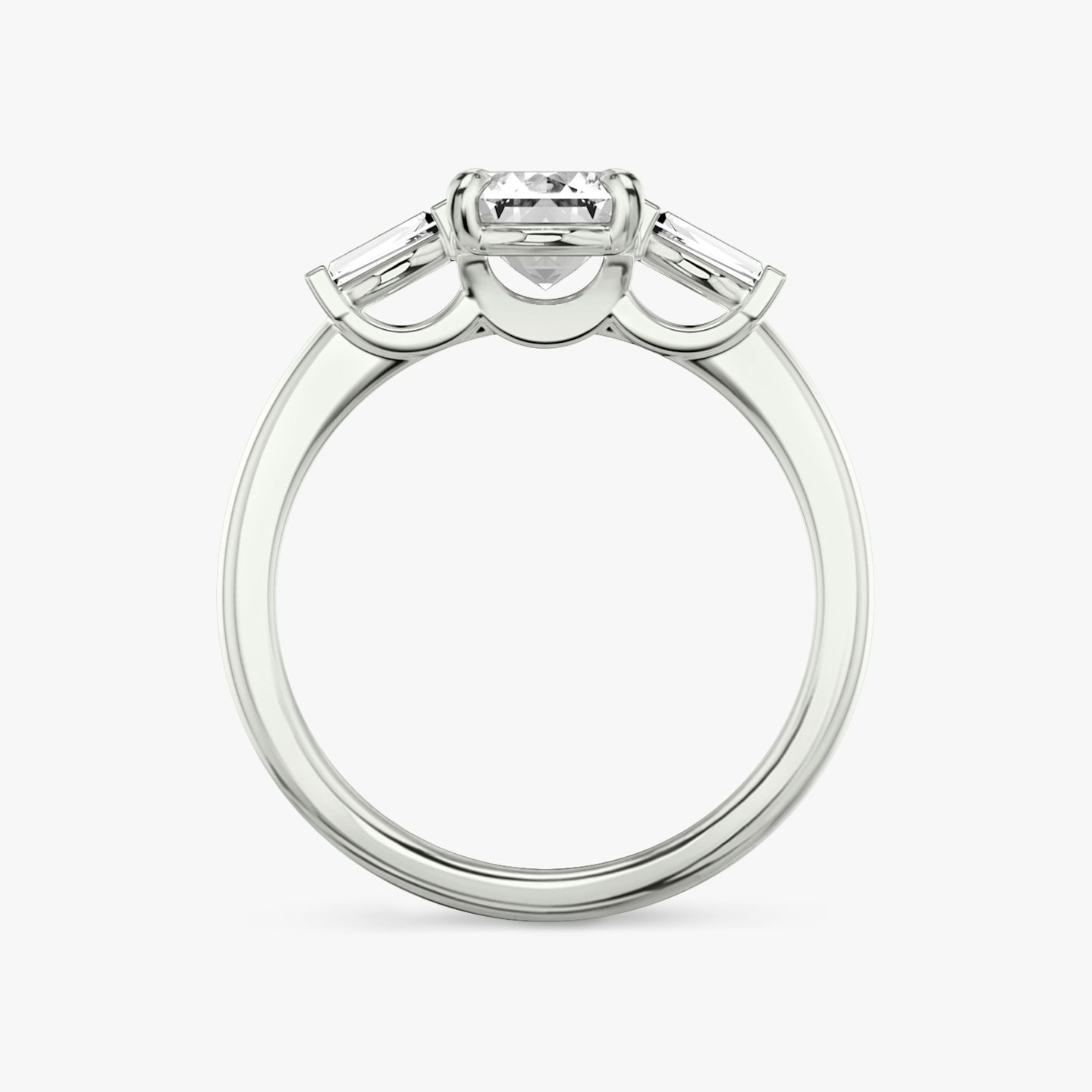 The Three Stone | Emerald | Platinum | bandAccent: Plain | sideStoneCarat: 0.10ct | sideStoneShape: Tapered Baguette | diamondOrientation: vertical | caratWeight: other