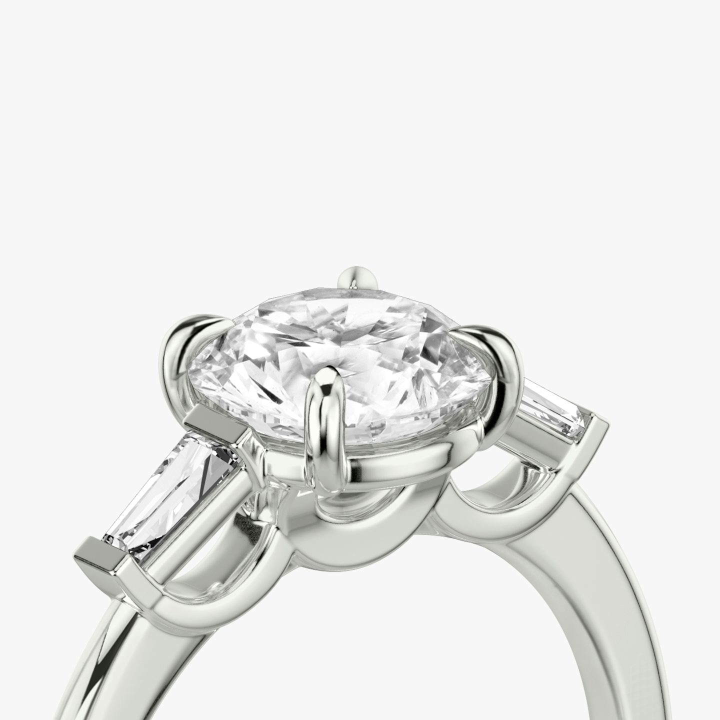 The Three Stone | Round Brilliant | Platinum | bandAccent: Plain | caratWeight: other | sideStoneCarat: 0.10ct | sideStoneShape: Tapered Baguette | diamondOrientation: vertical