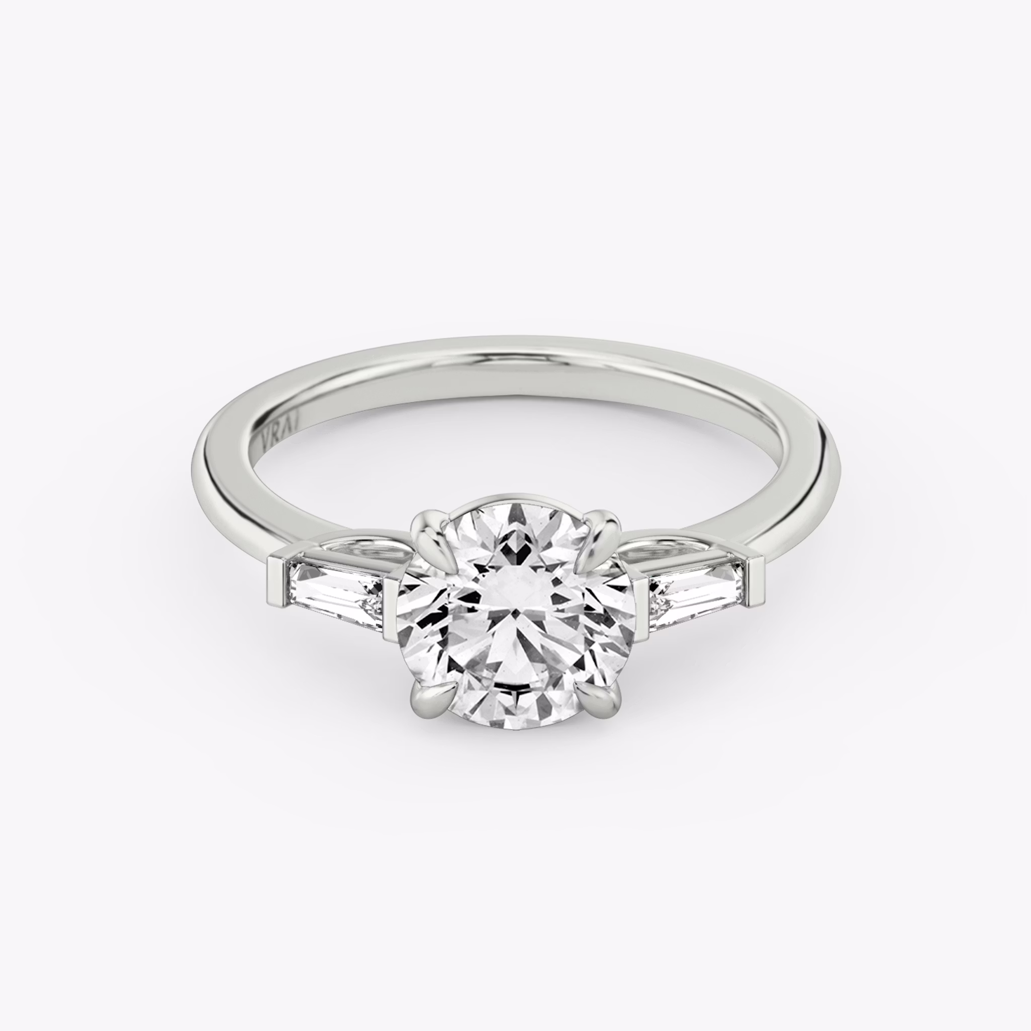 Round Brilliant Three Stone Baguette Engagement Ring