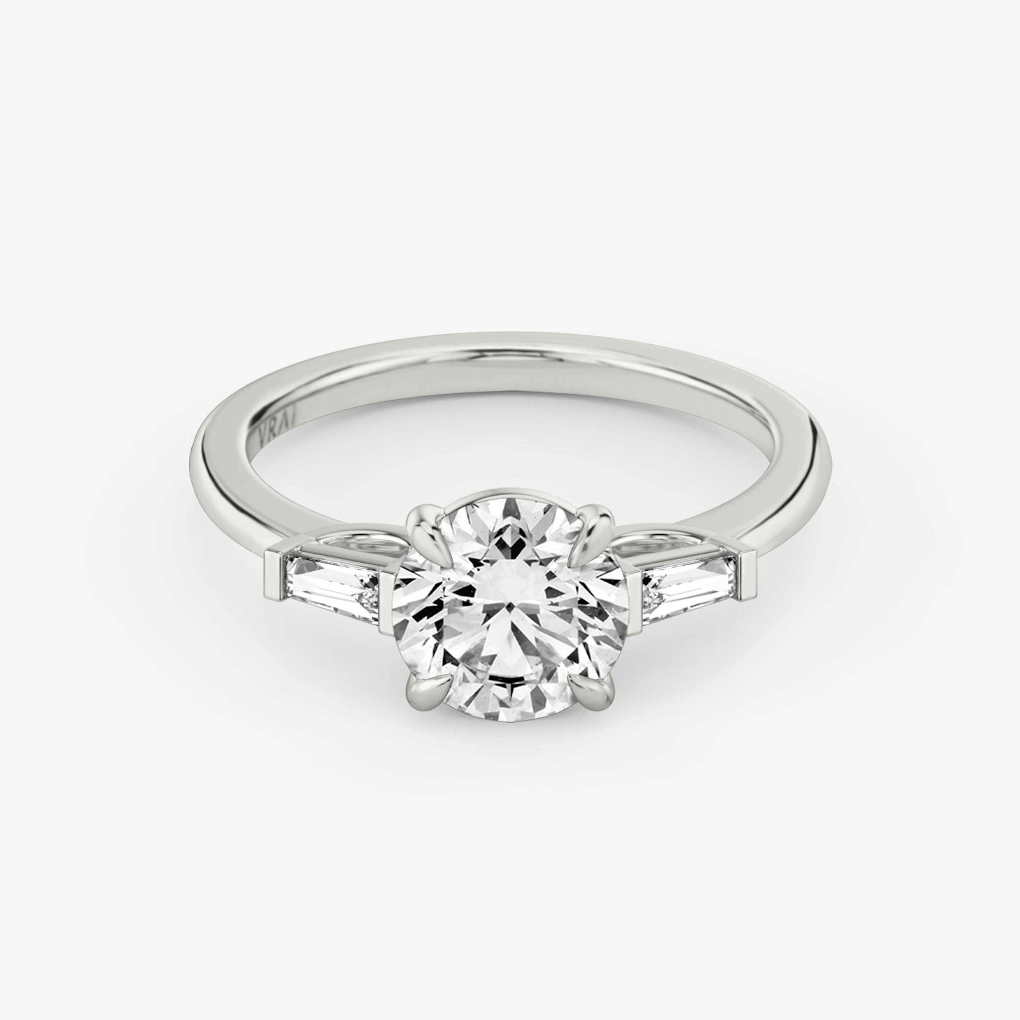 Round Brilliant Three Stone Baguette Engagement Ring