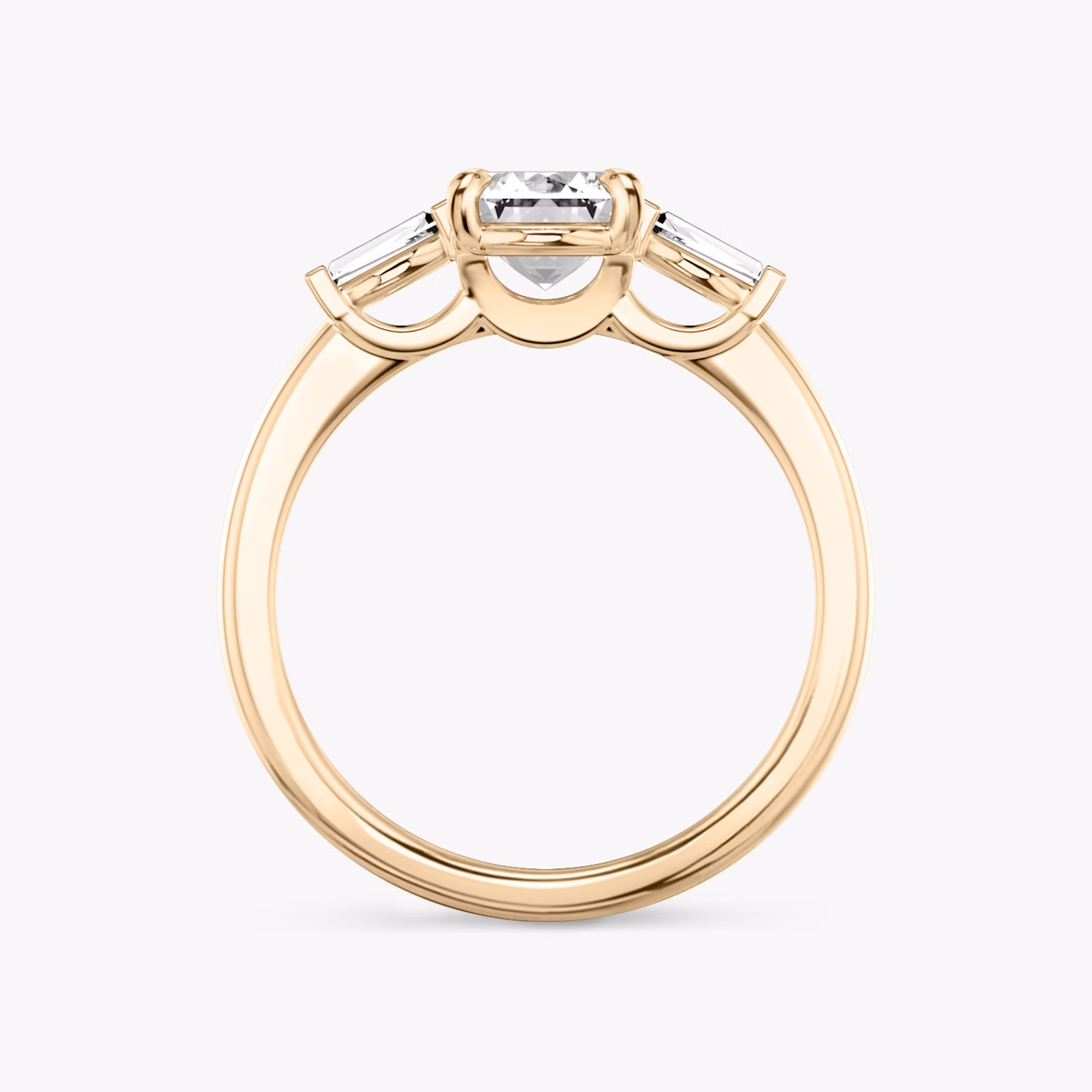 The Three Stone | Emerald | 14k | Rose Gold | bandAccent: Plain | sideStoneCarat: 0.10ct | sideStoneShape: Tapered Baguette | diamondOrientation: vertical | caratWeight: other