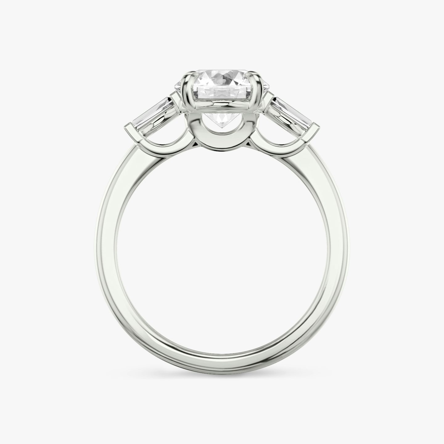 The Three Stone | Round Brilliant | Platinum | bandAccent: Plain | caratWeight: other | sideStoneCarat: 0.10ct | sideStoneShape: Tapered Baguette | diamondOrientation: vertical
