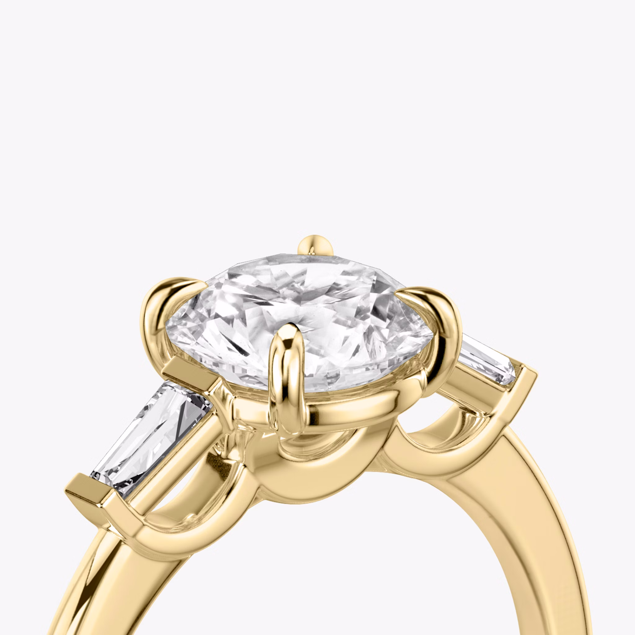 The Three Stone | Round Brilliant | 18k | Yellow Gold | bandAccent: Plain | caratWeight: other | sideStoneCarat: 0.10ct | sideStoneShape: Tapered Baguette | diamondOrientation: vertical