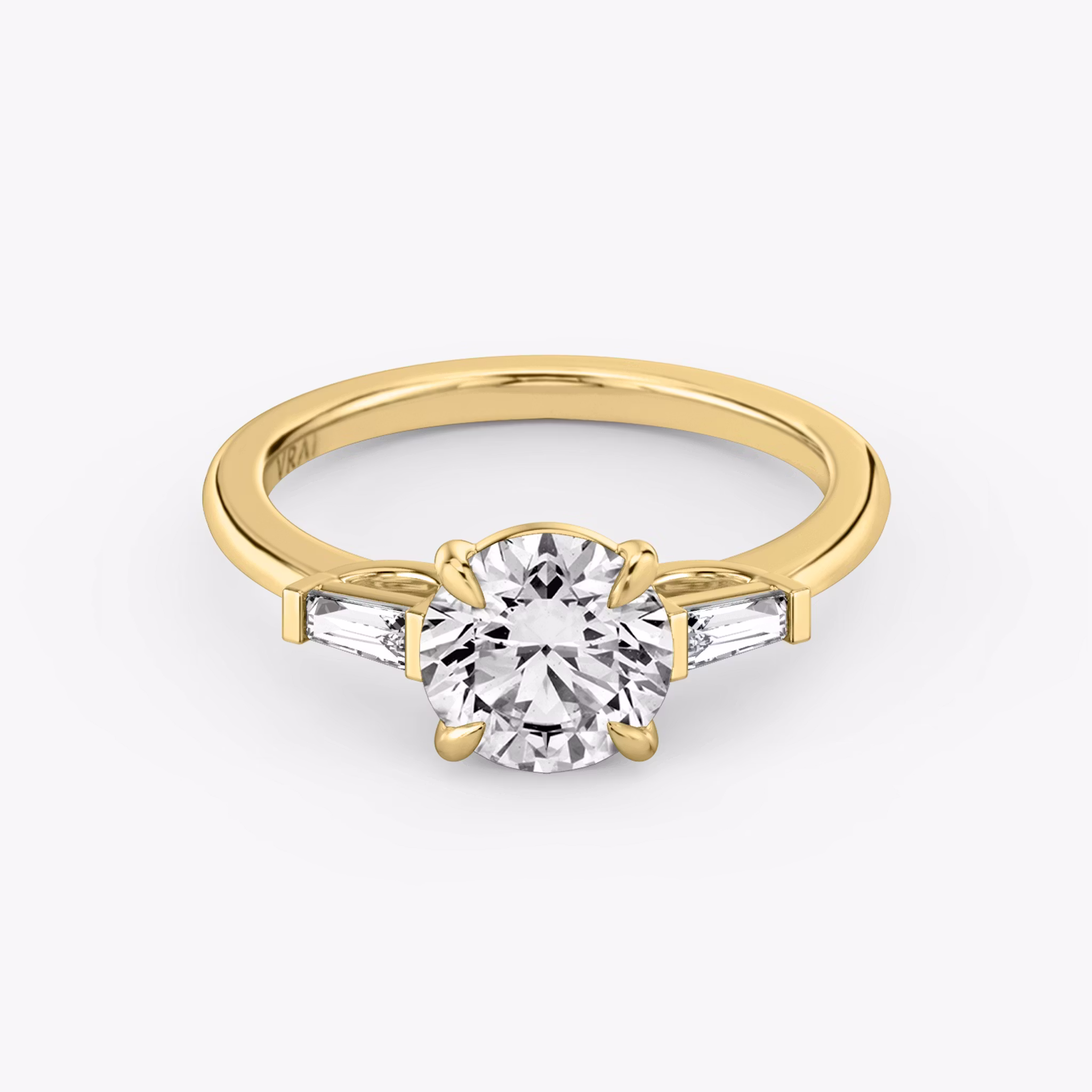 The Three Stone Round Brilliant | Yellow Gold