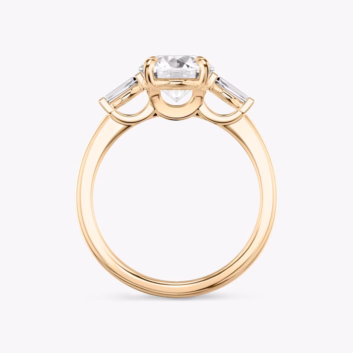 The Three Stone | Round Brilliant | 14k | Rose Gold | bandAccent: Plain | caratWeight: other | sideStoneCarat: 0.10ct | sideStoneShape: Tapered Baguette | diamondOrientation: vertical