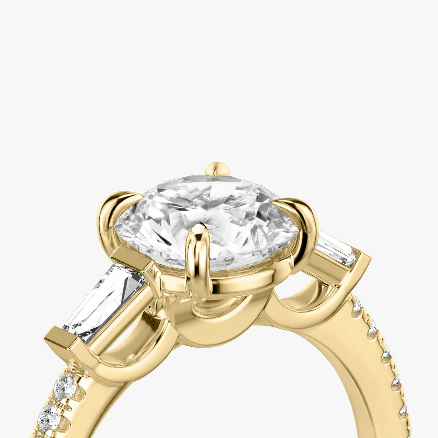 The Three Stone | Round Brilliant | 18k | Yellow Gold | bandAccent: Pavé | caratWeight: other | sideStoneCarat: 0.10ct | sideStoneShape: Tapered Baguette | diamondOrientation: vertical