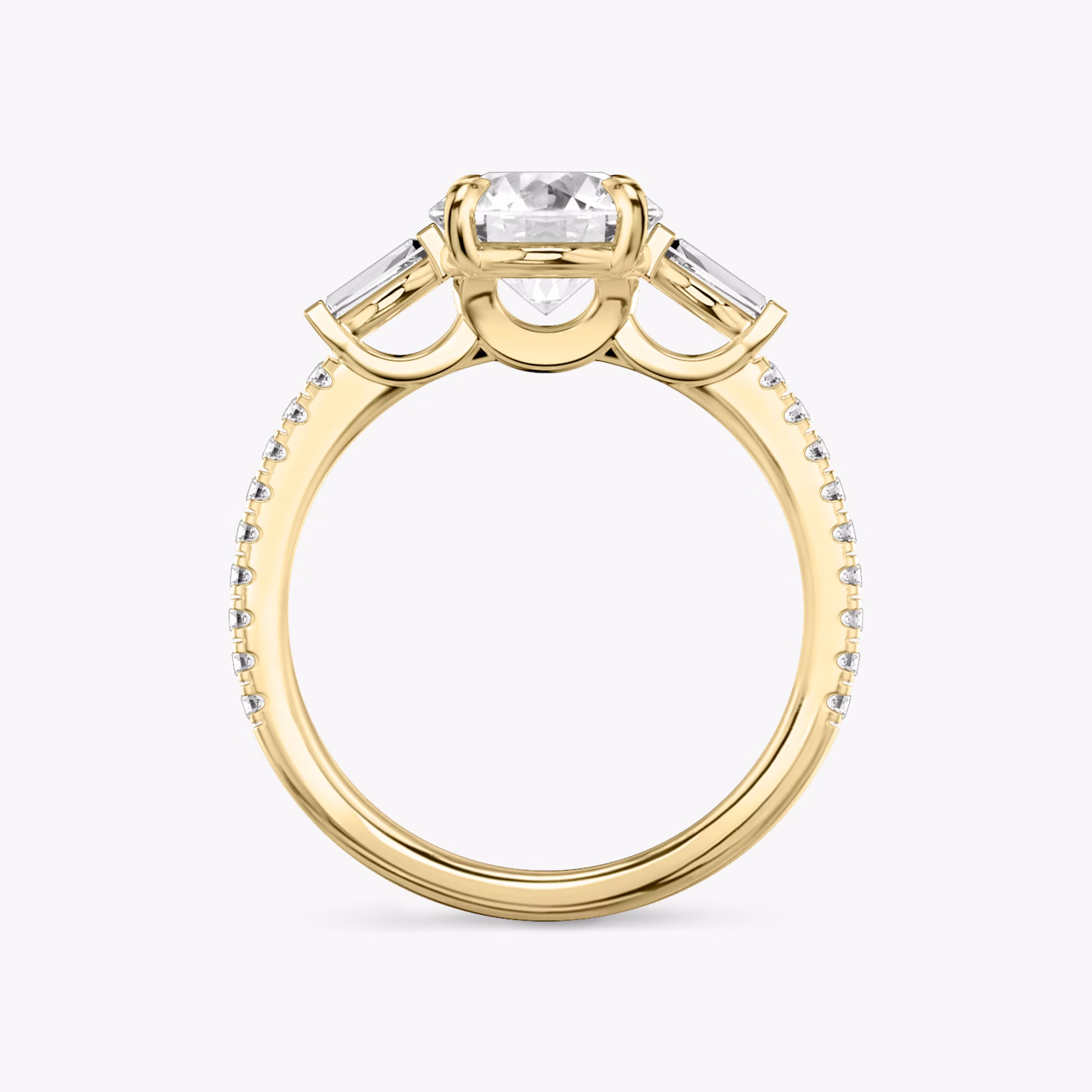 The Three Stone | Round Brilliant | 18k | Yellow Gold | bandAccent: Pavé | caratWeight: other | sideStoneCarat: 0.10ct | sideStoneShape: Tapered Baguette | diamondOrientation: vertical