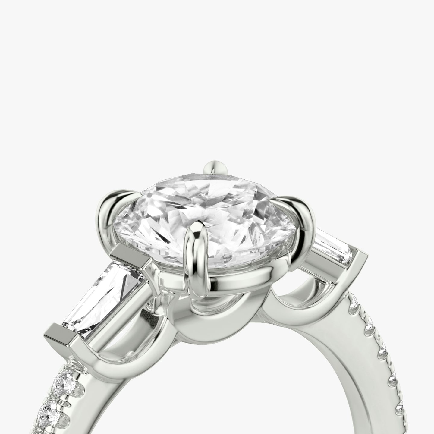The Three Stone | Round Brilliant | 18k | White Gold | bandAccent: Pavé | caratWeight: other | sideStoneCarat: 0.10ct | sideStoneShape: Tapered Baguette | diamondOrientation: vertical