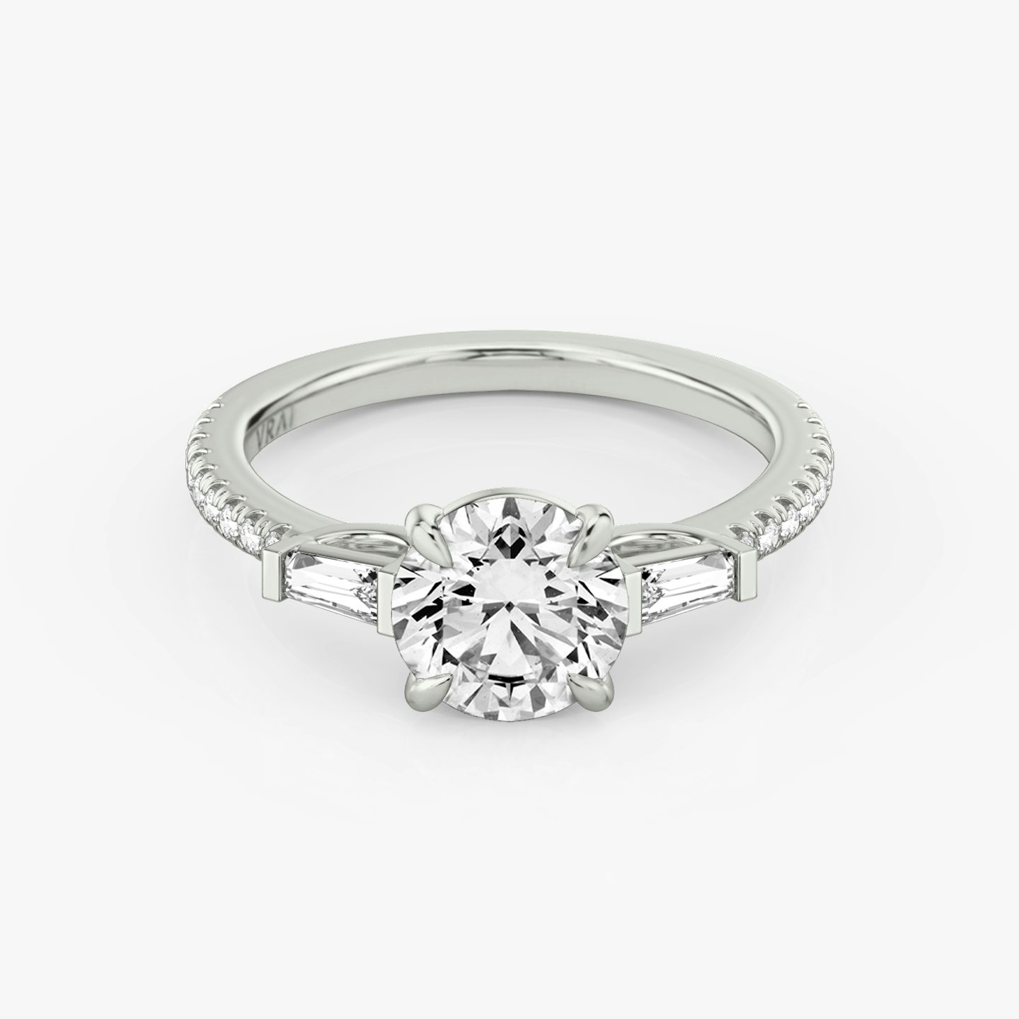 The Three Stone | Round Brilliant | 18k | White Gold | bandAccent: Pavé | caratWeight: other | sideStoneCarat: 0.10ct | sideStoneShape: Tapered Baguette | diamondOrientation: vertical