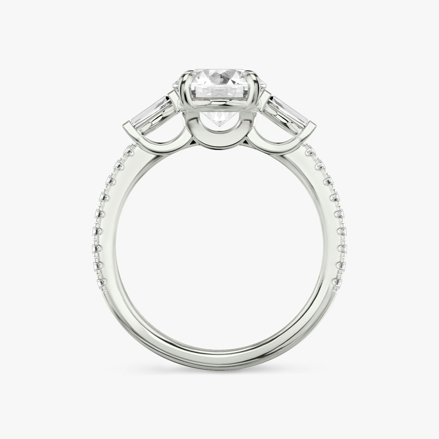 The Three Stone | Round Brilliant | 18k | White Gold | bandAccent: Pavé | caratWeight: other | sideStoneCarat: 0.10ct | sideStoneShape: Tapered Baguette | diamondOrientation: vertical