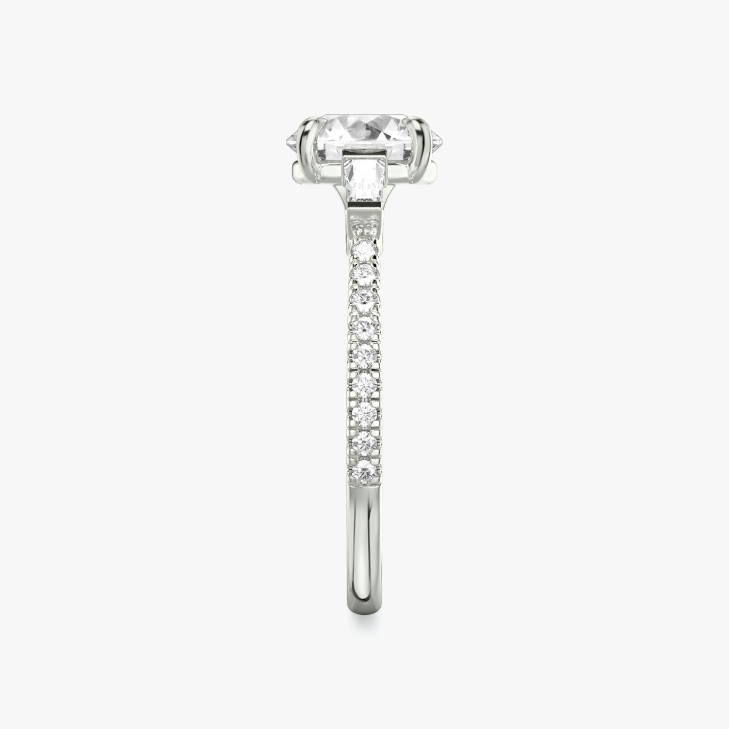 The Three Stone | Round Brilliant | 18k | White Gold | bandAccent: Pavé | caratWeight: other | sideStoneCarat: 0.10ct | sideStoneShape: Tapered Baguette | diamondOrientation: vertical
