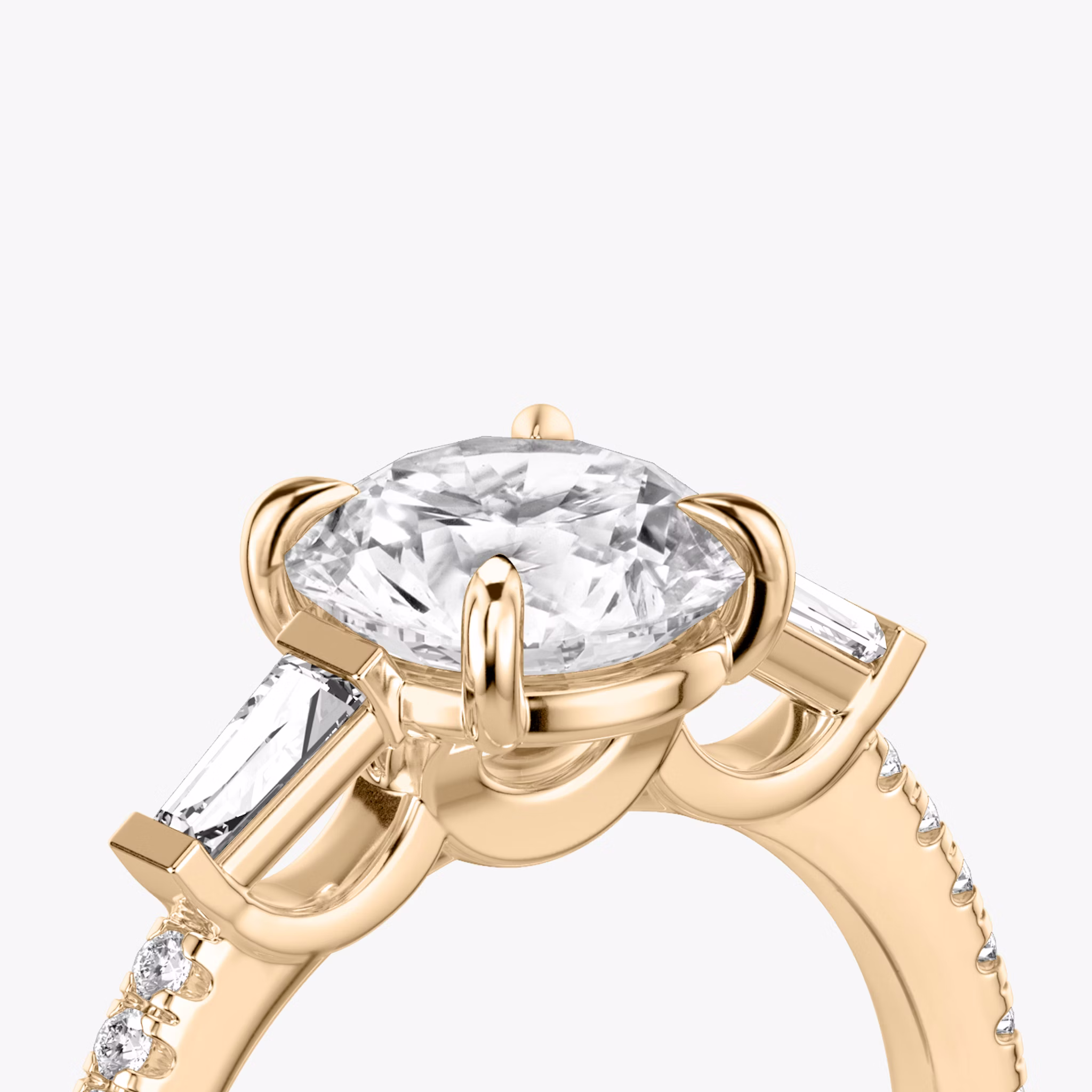The Three Stone | Round Brilliant | 14k | Rose Gold | bandAccent: Pavé | caratWeight: other | sideStoneCarat: 0.10ct | sideStoneShape: Tapered Baguette | diamondOrientation: vertical