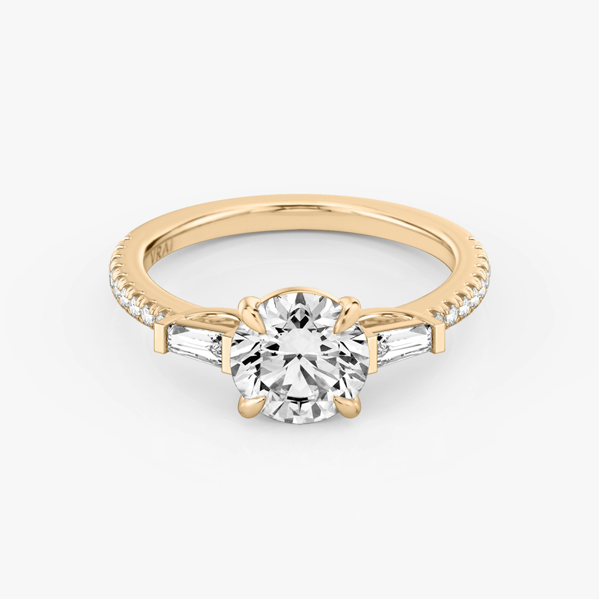 The Three Stone | Round Brilliant | 14k | Rose Gold | bandAccent: Pavé | caratWeight: other | sideStoneCarat: 0.10ct | sideStoneShape: Tapered Baguette | diamondOrientation: vertical