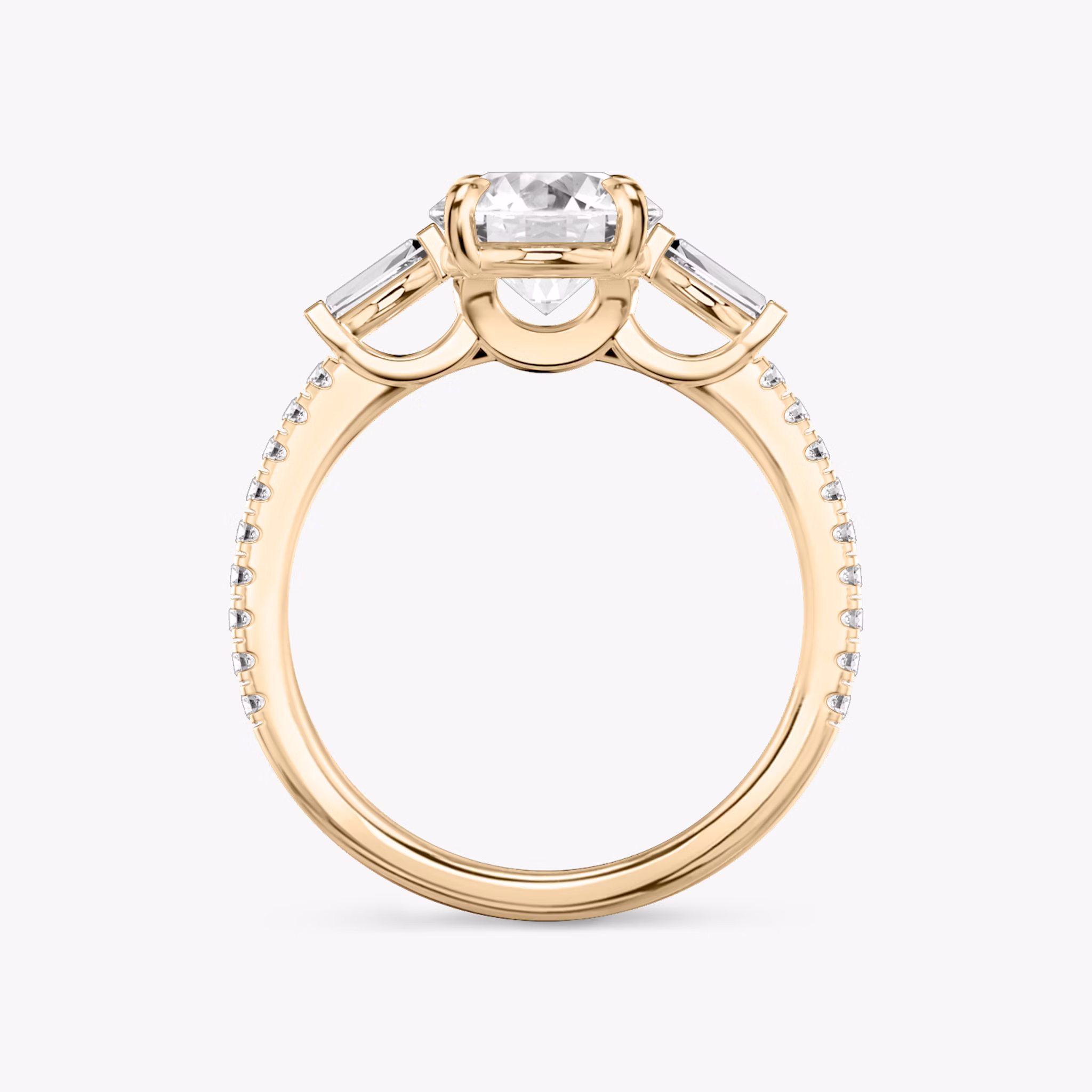 The Three Stone | Round Brilliant | 14k | Rose Gold | bandAccent: Pavé | caratWeight: other | sideStoneCarat: 0.10ct | sideStoneShape: Tapered Baguette | diamondOrientation: vertical