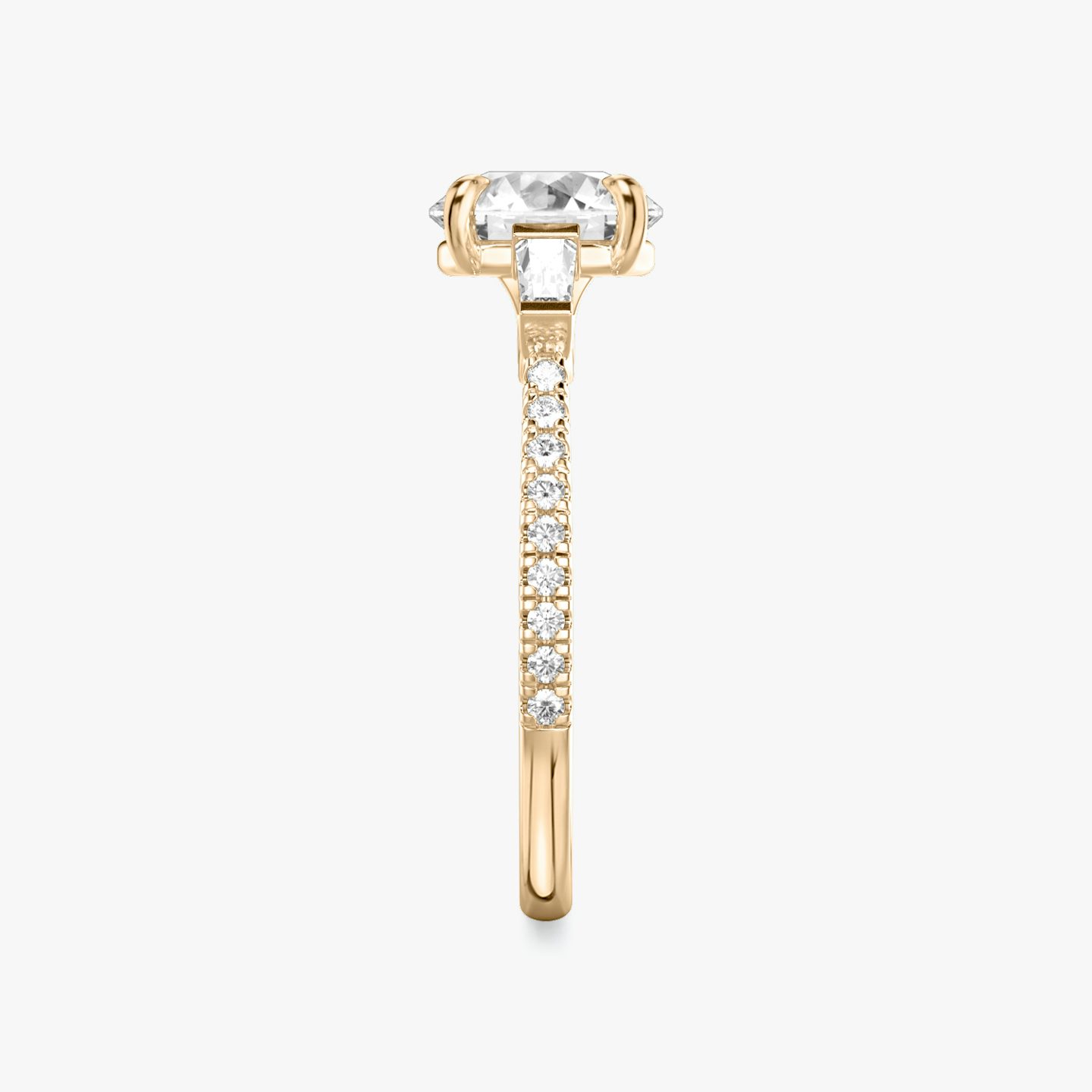 The Three Stone | Round Brilliant | 14k | Rose Gold | bandAccent: Pavé | caratWeight: other | sideStoneCarat: 0.10ct | sideStoneShape: Tapered Baguette | diamondOrientation: vertical