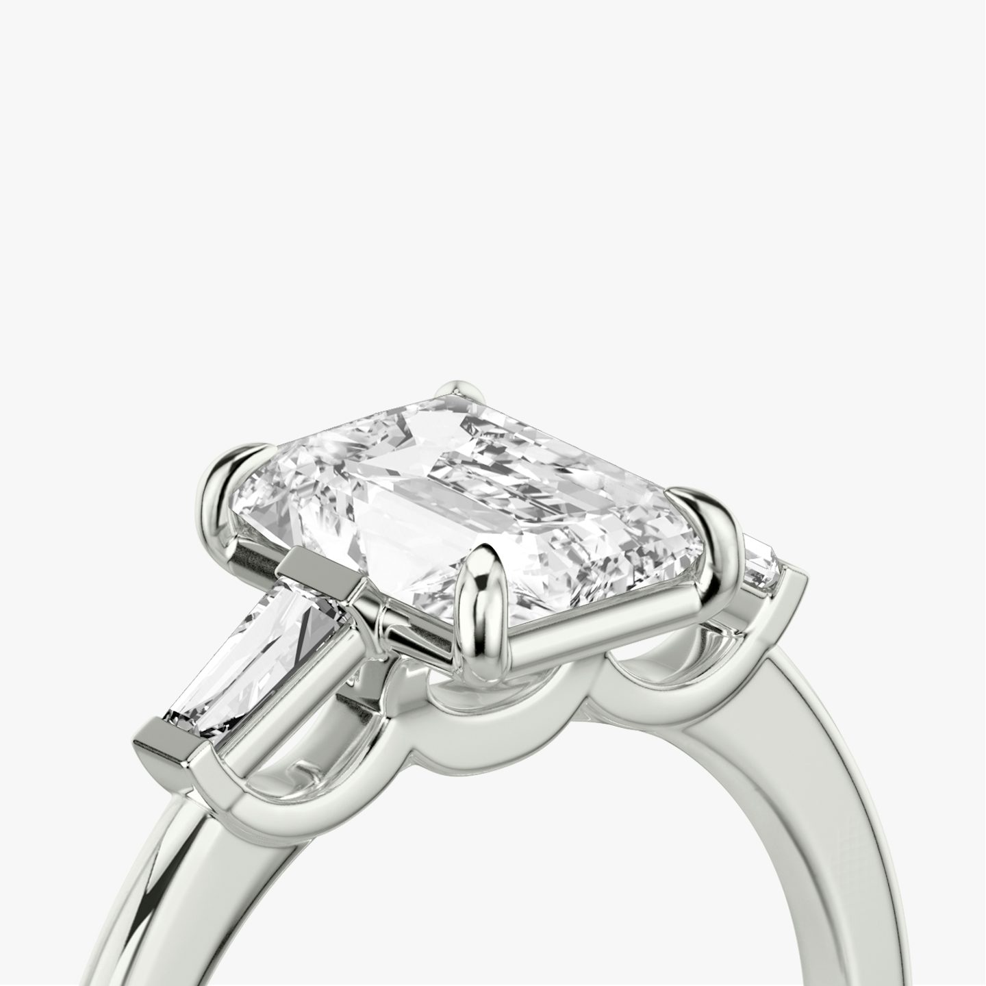 The Three Stone | Radiant | 18k | White Gold | bandAccent: Plain | sideStoneCarat: 0.10ct | sideStoneShape: Tapered Baguette | diamondOrientation: vertical | caratWeight: other