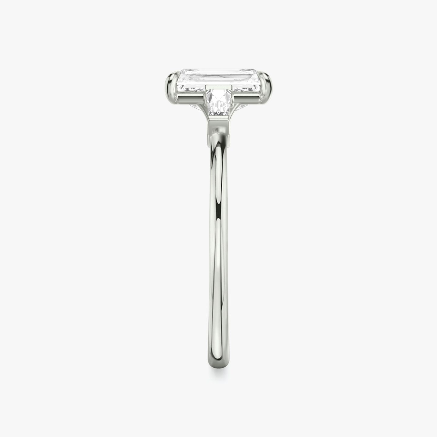 The Three Stone | Radiant | 18k | White Gold | bandAccent: Plain | sideStoneCarat: 0.10ct | sideStoneShape: Tapered Baguette | diamondOrientation: vertical | caratWeight: other