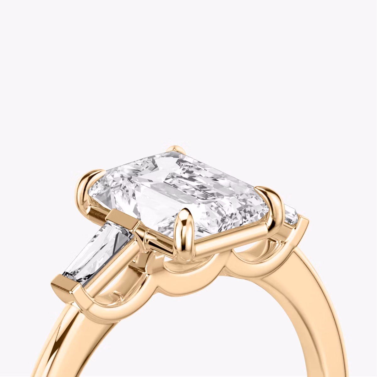 The Three Stone | Radiant | 14k | Rose Gold | bandAccent: Plain | sideStoneCarat: 0.10ct | sideStoneShape: Tapered Baguette | diamondOrientation: vertical | caratWeight: other