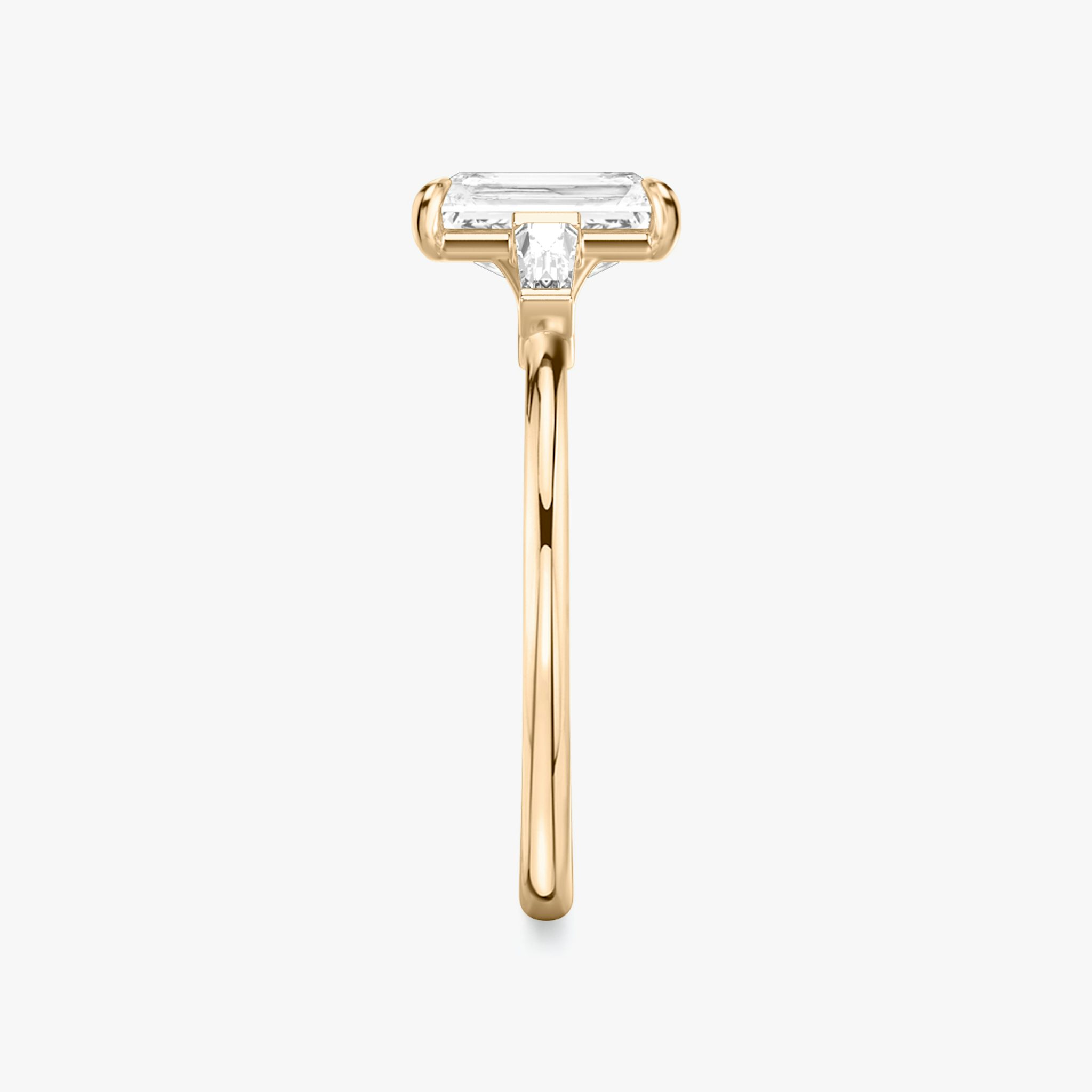 The Three Stone | Radiant | 14k | Rose Gold | bandAccent: Plain | sideStoneCarat: 0.10ct | sideStoneShape: Tapered Baguette | diamondOrientation: vertical | caratWeight: other