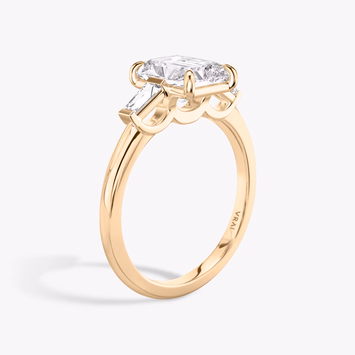 The Three Stone | Radiant | 14k | Rose Gold | bandAccent: Plain | sideStoneCarat: 0.10ct | sideStoneShape: Tapered Baguette | diamondOrientation: vertical | caratWeight: other