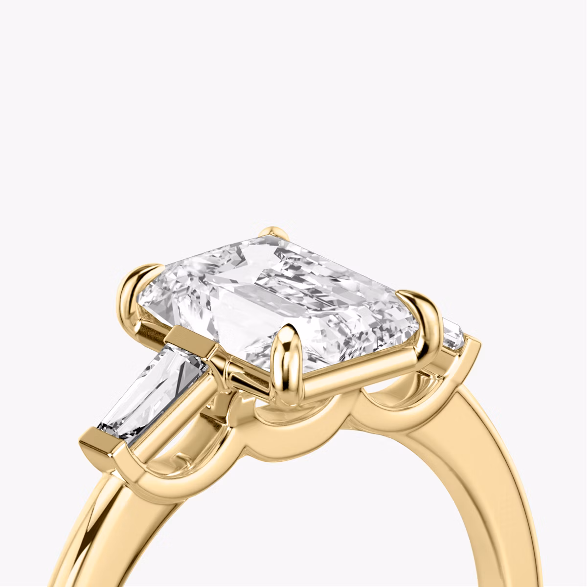 The Three Stone | Radiant | 18k | Yellow Gold | bandAccent: Plain | sideStoneCarat: 0.10ct | sideStoneShape: Tapered Baguette | diamondOrientation: vertical | caratWeight: other