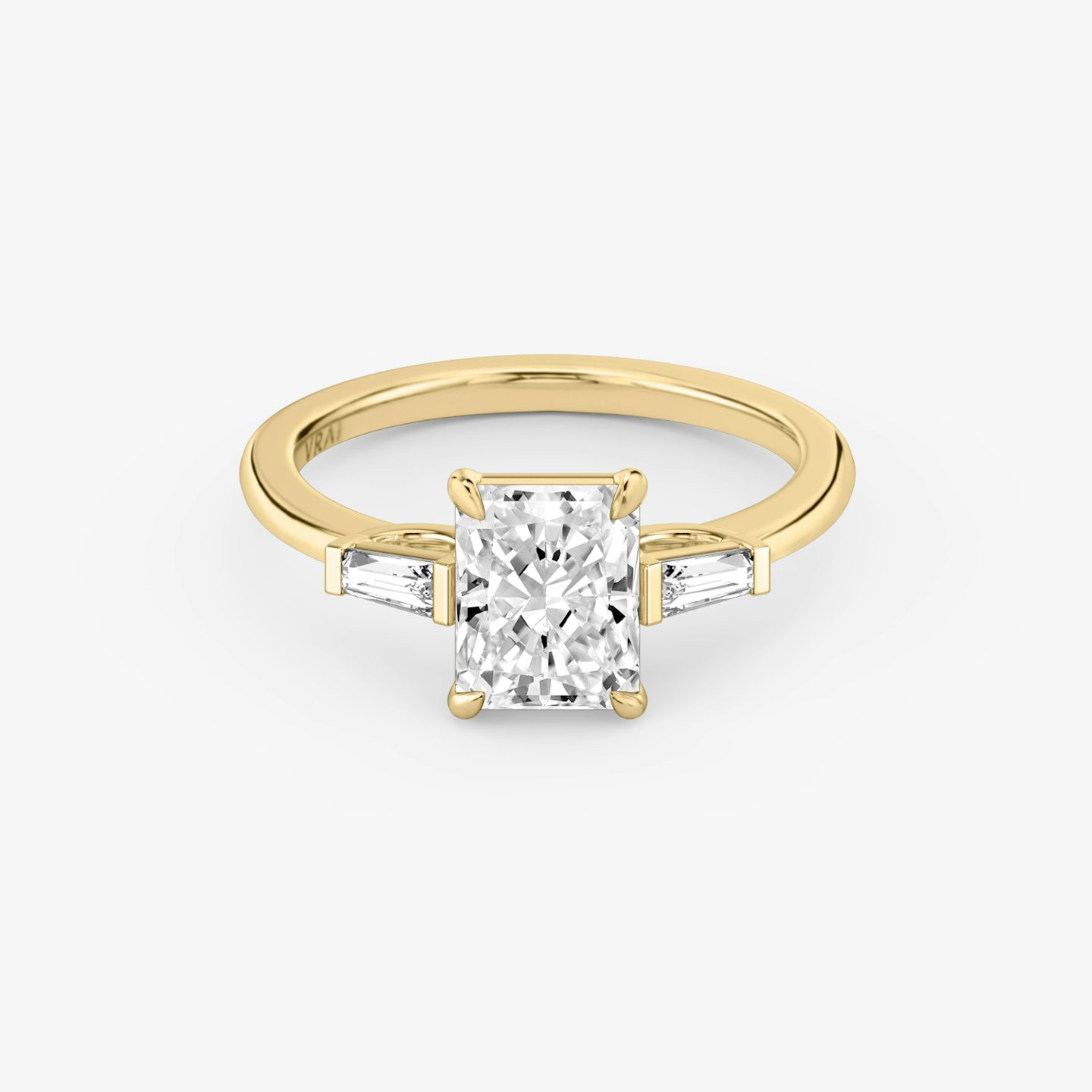 The Three Stone | Radiant | 18k | Yellow Gold | bandAccent: Plain | sideStoneCarat: 0.10ct | sideStoneShape: Tapered Baguette | diamondOrientation: vertical | caratWeight: other
