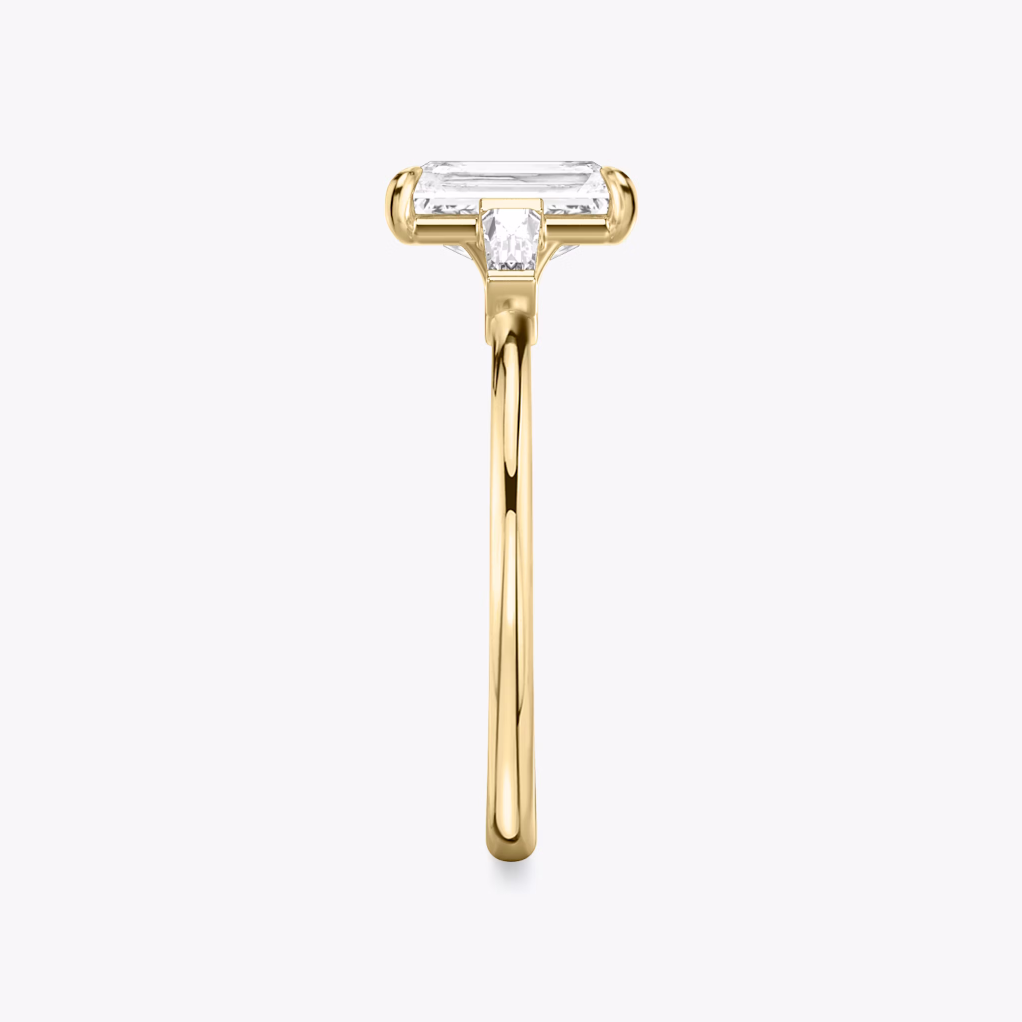 The Three Stone | Radiant | 18k | Yellow Gold | bandAccent: Plain | sideStoneCarat: 0.10ct | sideStoneShape: Tapered Baguette | diamondOrientation: vertical | caratWeight: other