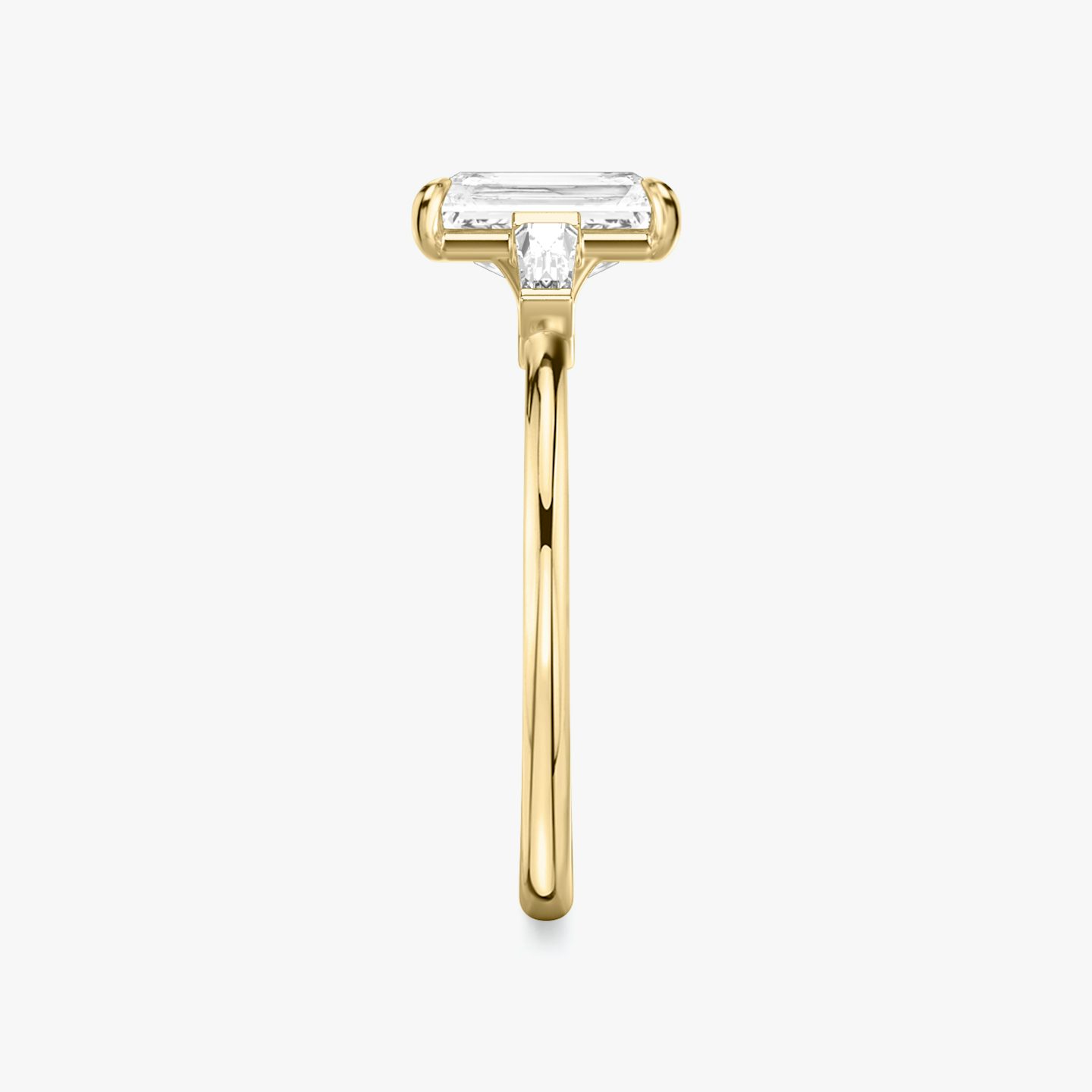 The Three Stone | Radiant | 18k | Yellow Gold | bandAccent: Plain | sideStoneCarat: 0.10ct | sideStoneShape: Tapered Baguette | diamondOrientation: vertical | caratWeight: other