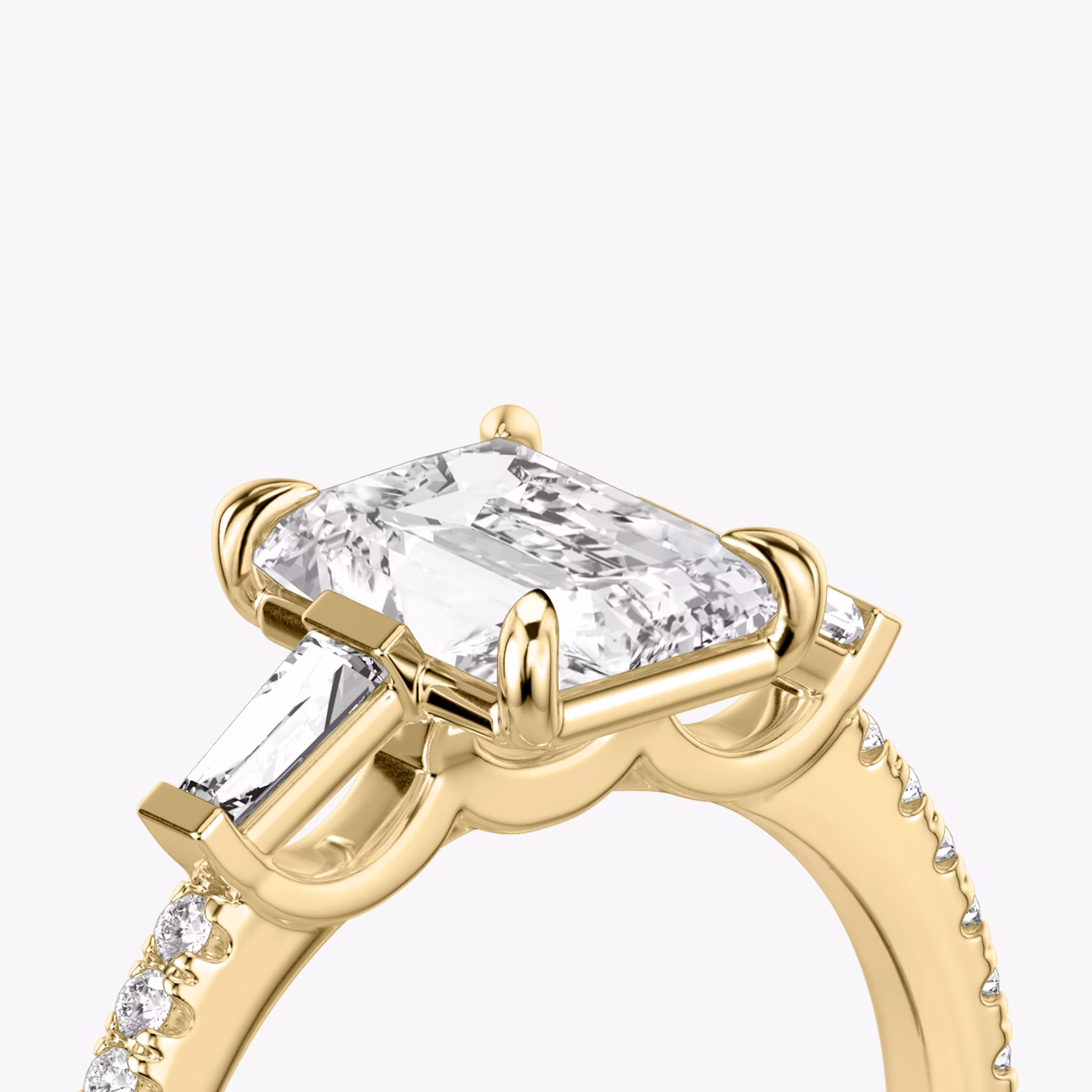 The Three Stone | Radiant | 18k | Yellow Gold | bandAccent: Pavé | sideStoneCarat: 0.10ct | sideStoneShape: Tapered Baguette | diamondOrientation: vertical | caratWeight: other