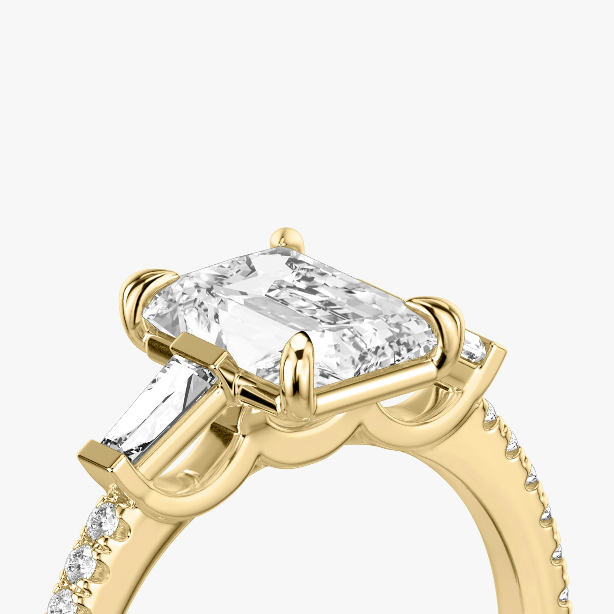 The Three Stone | Radiant | 18k | Yellow Gold | bandAccent: Pavé | sideStoneCarat: 0.10ct | sideStoneShape: Tapered Baguette | diamondOrientation: vertical | caratWeight: other