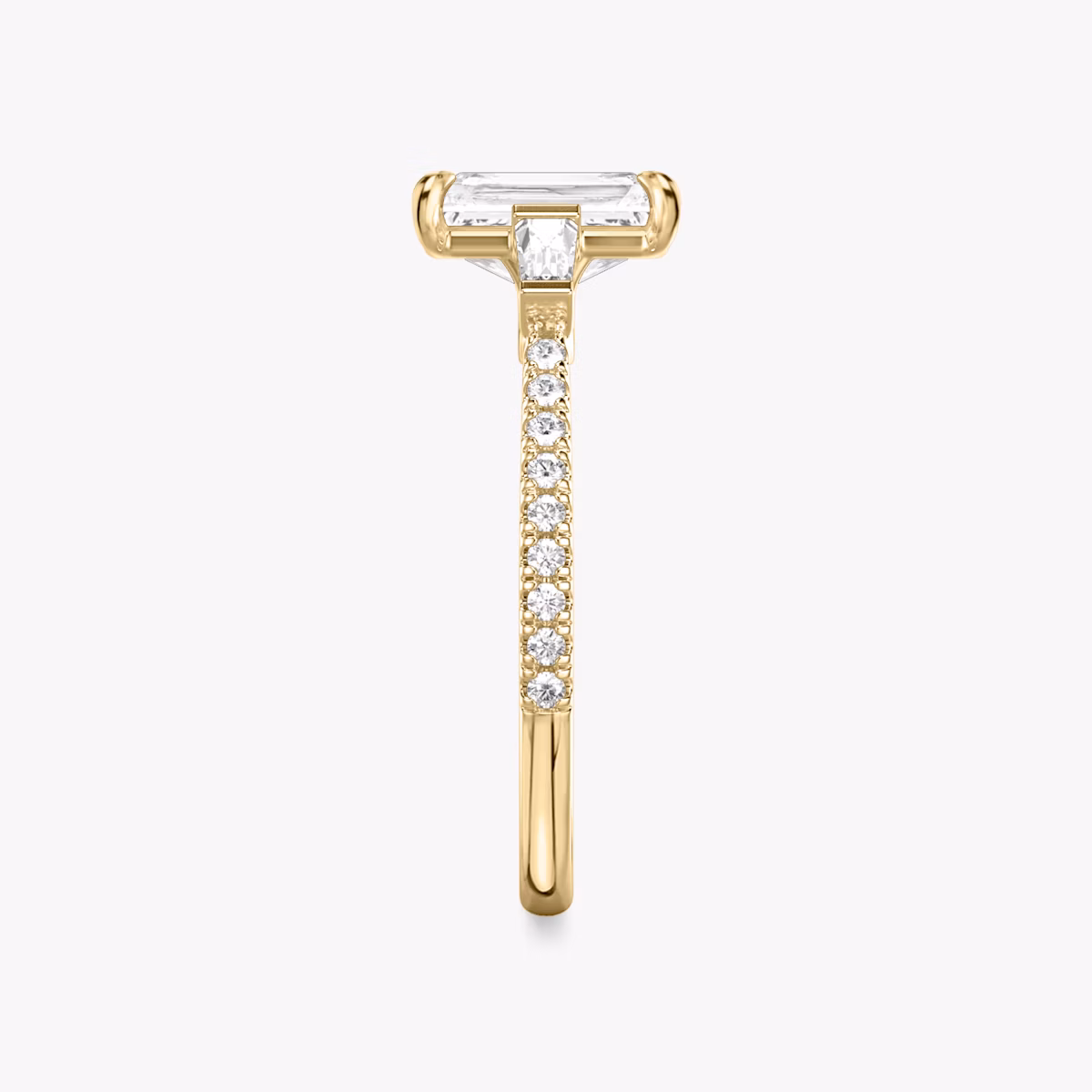 The Three Stone | Radiant | 18k | Yellow Gold | bandAccent: Pavé | sideStoneCarat: 0.10ct | sideStoneShape: Tapered Baguette | diamondOrientation: vertical | caratWeight: other