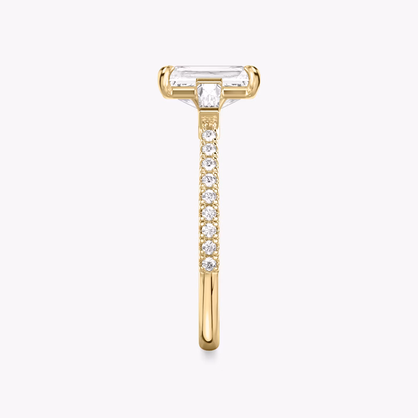 The Three Stone | Radiant | 18k | Yellow Gold | bandAccent: Pavé | sideStoneCarat: 0.10ct | sideStoneShape: Tapered Baguette | diamondOrientation: vertical | caratWeight: other