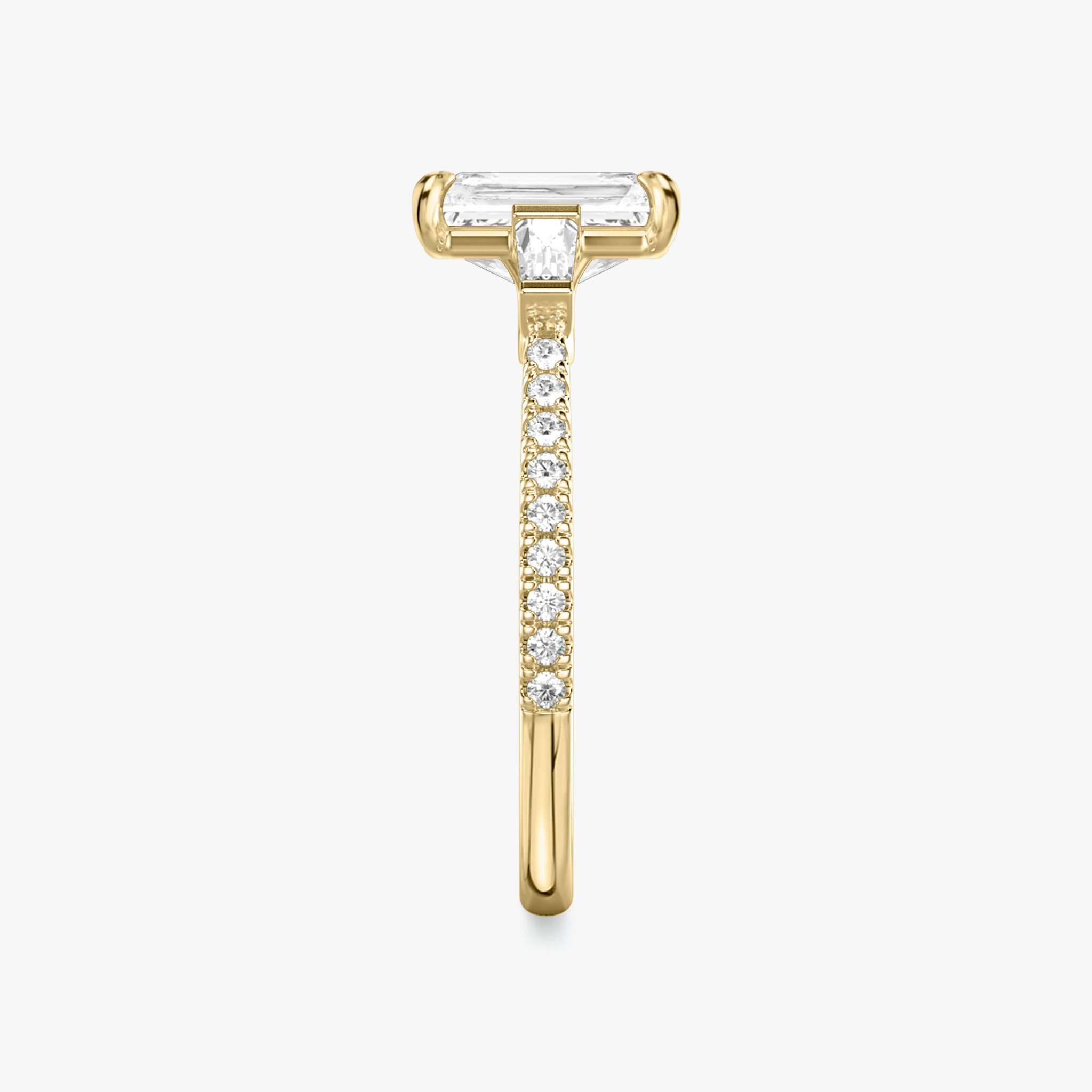 The Three Stone | Radiant | 18k | Yellow Gold | bandAccent: Pavé | sideStoneCarat: 0.10ct | sideStoneShape: Tapered Baguette | diamondOrientation: vertical | caratWeight: other