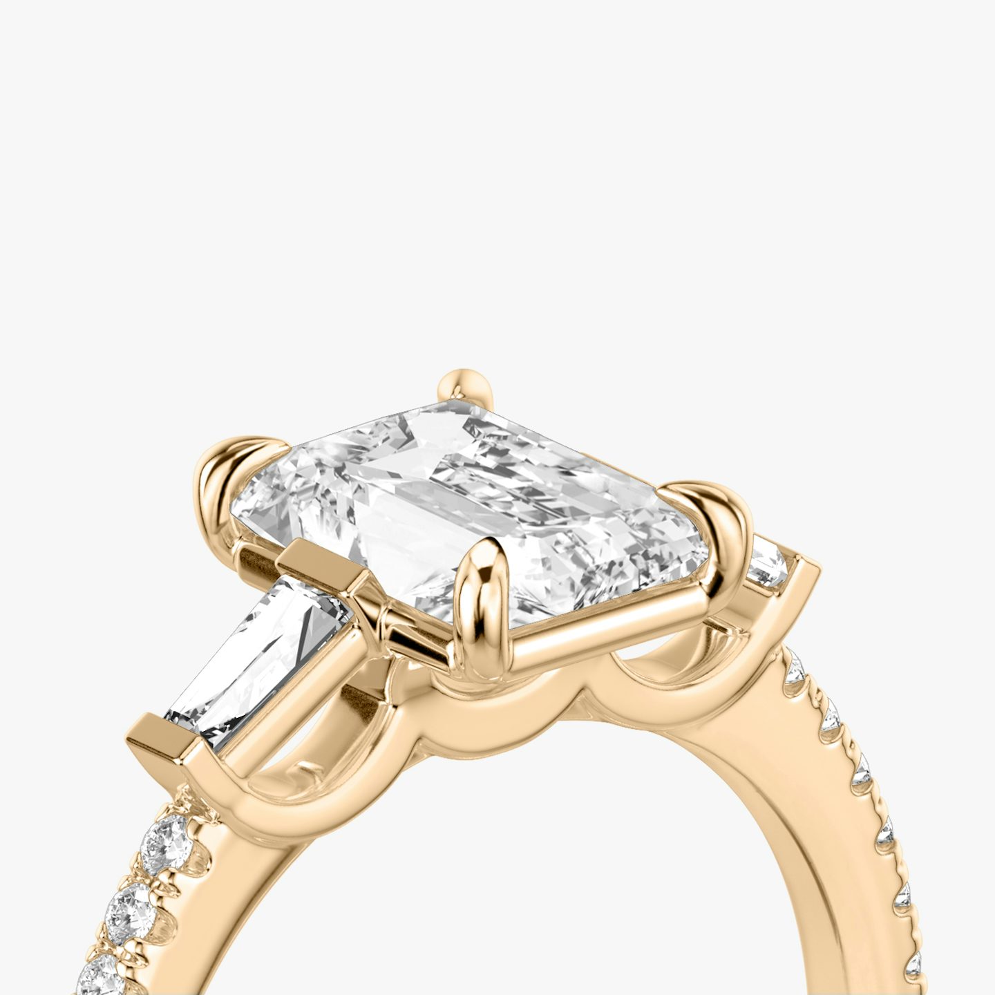 The Three Stone | Radiant | 14k | Rose Gold | bandAccent: Pavé | sideStoneCarat: 0.10ct | sideStoneShape: Tapered Baguette | diamondOrientation: vertical | caratWeight: other