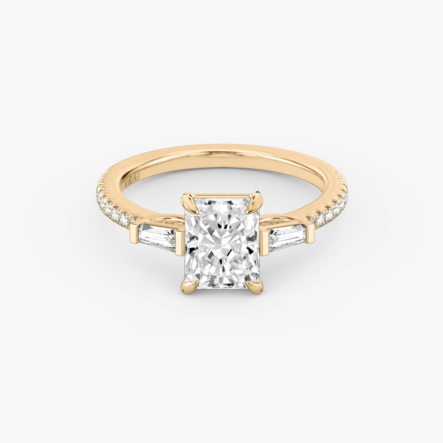 The Three Stone | Radiant | 14k | Rose Gold | bandAccent: Pavé | sideStoneCarat: 0.10ct | sideStoneShape: Tapered Baguette | diamondOrientation: vertical | caratWeight: other