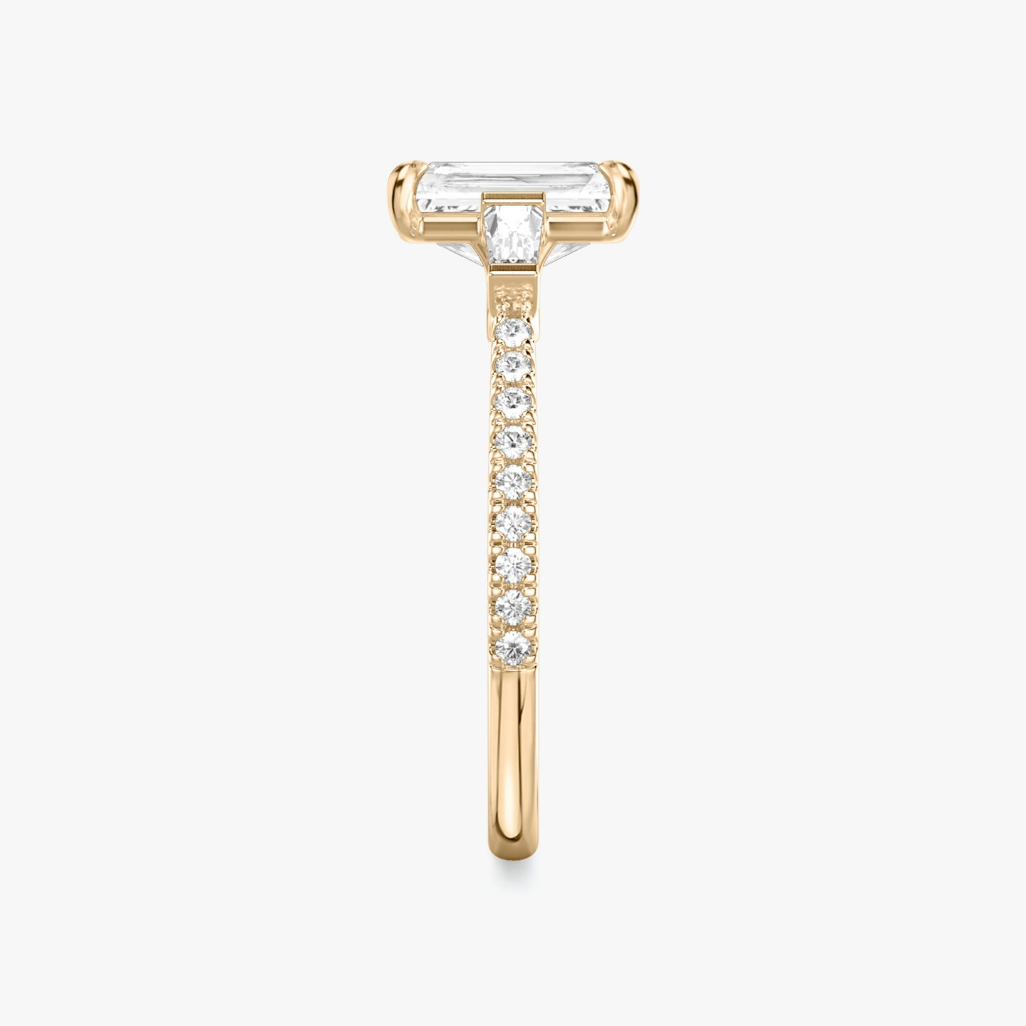 The Three Stone | Radiant | 14k | Rose Gold | bandAccent: Pavé | sideStoneCarat: 0.10ct | sideStoneShape: Tapered Baguette | diamondOrientation: vertical | caratWeight: other
