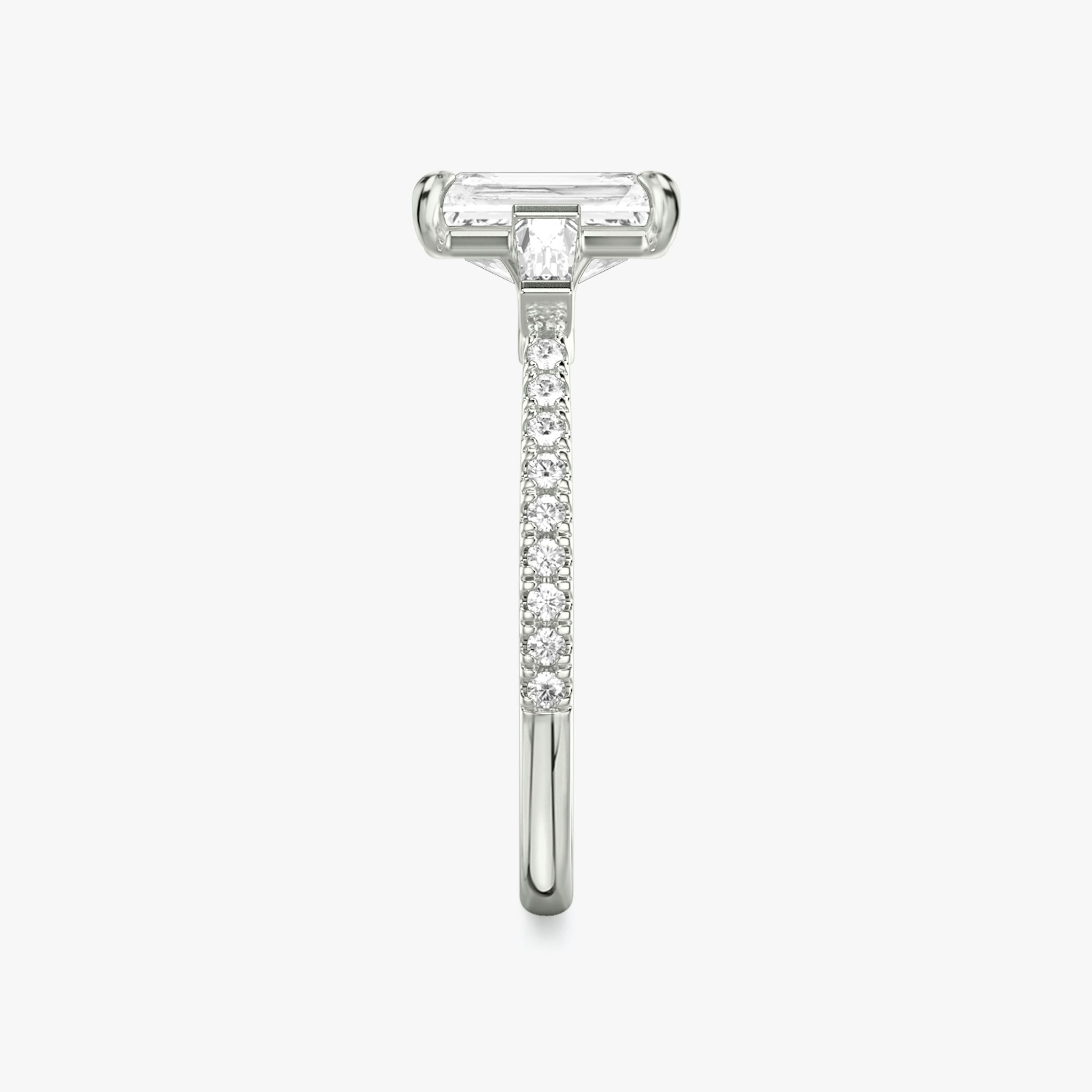 The Three Stone | Radiant | Platinum | bandAccent: Pavé | sideStoneCarat: 0.10ct | sideStoneShape: Tapered Baguette | diamondOrientation: vertical | caratWeight: other