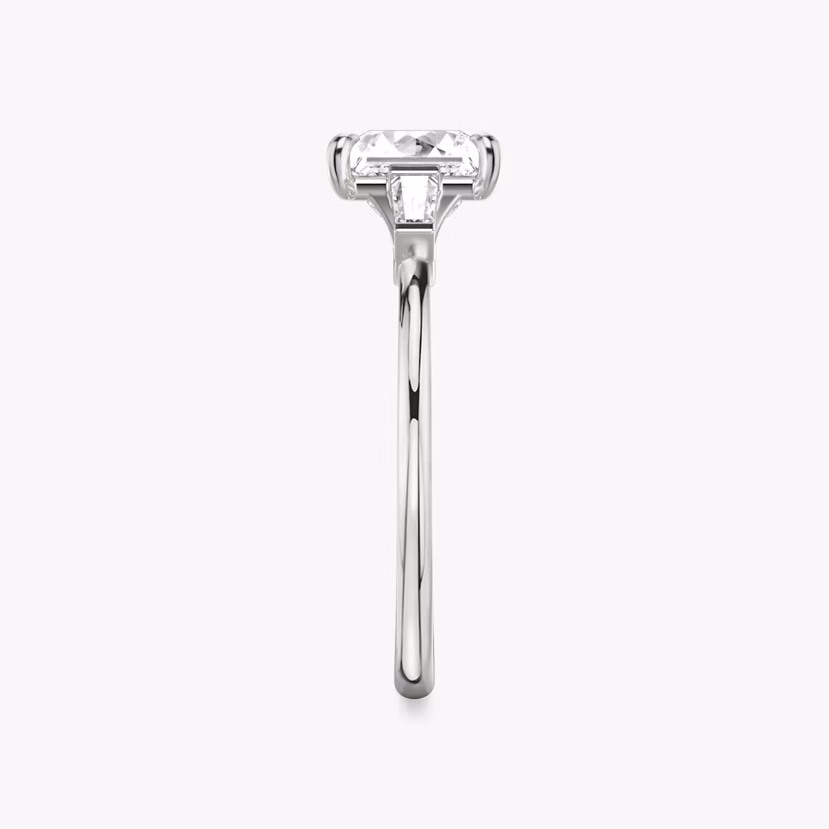 The Three Stone | Princess | Platinum | bandAccent: Plain | sideStoneCarat: 0.10ct | sideStoneShape: Tapered Baguette | diamondOrientation: vertical | caratWeight: other