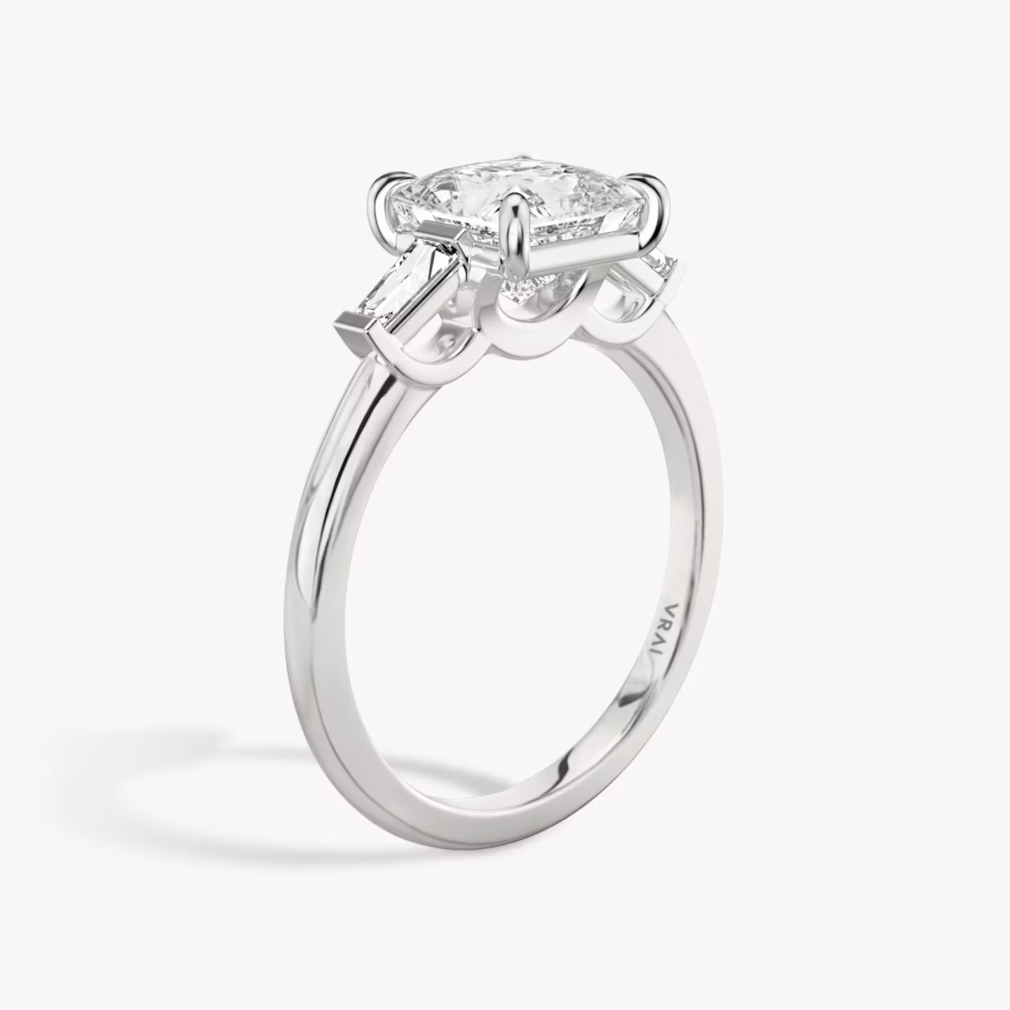 The Three Stone | Princess | 18k | White Gold | bandAccent: Plain | sideStoneCarat: 0.10ct | sideStoneShape: Tapered Baguette | diamondOrientation: vertical | caratWeight: other