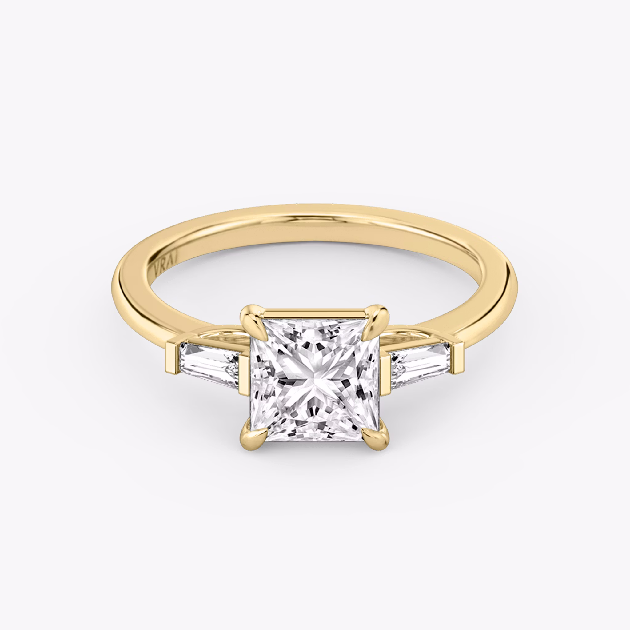 The Three Stone | Princess | 18k | Yellow Gold | bandAccent: Plain | sideStoneCarat: 0.10ct | sideStoneShape: Tapered Baguette | diamondOrientation: vertical | caratWeight: other