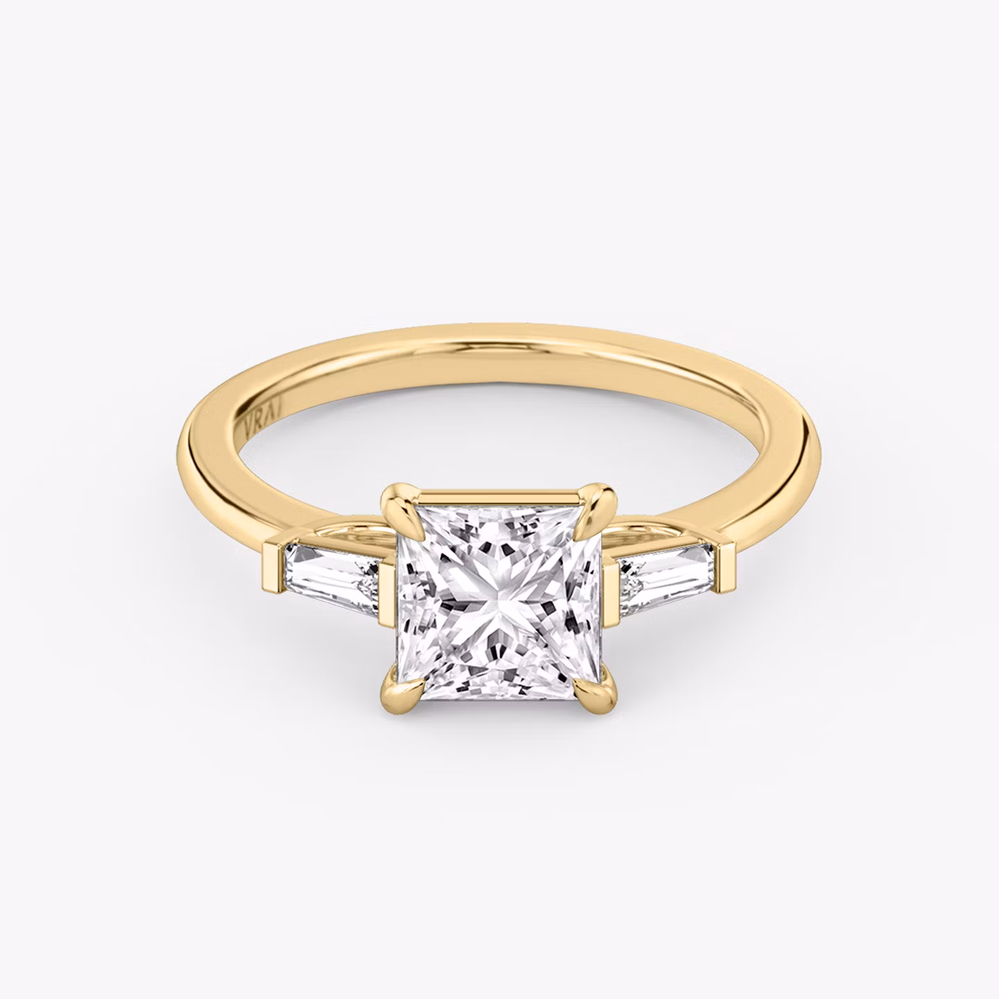 The Three Stone | Princess | 18k | Yellow Gold | bandAccent: Plain | sideStoneCarat: 0.10ct | sideStoneShape: Tapered Baguette | diamondOrientation: vertical | caratWeight: other
