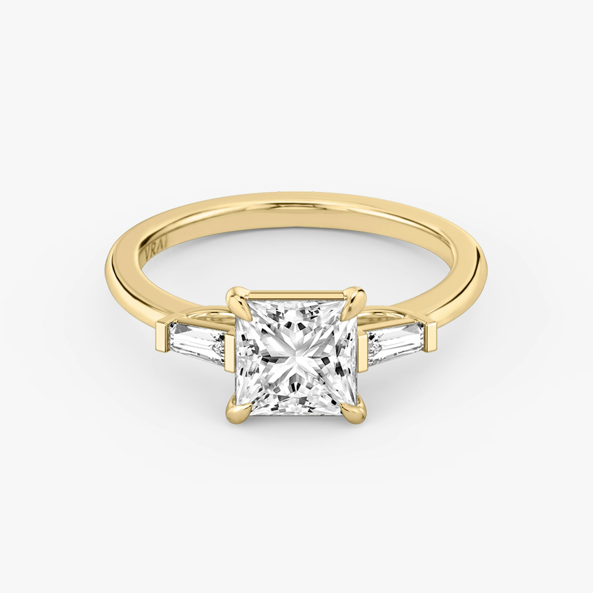 The Three Stone | Princess | 18k | Yellow Gold | bandAccent: Plain | sideStoneCarat: 0.10ct | sideStoneShape: Tapered Baguette | diamondOrientation: vertical | caratWeight: other