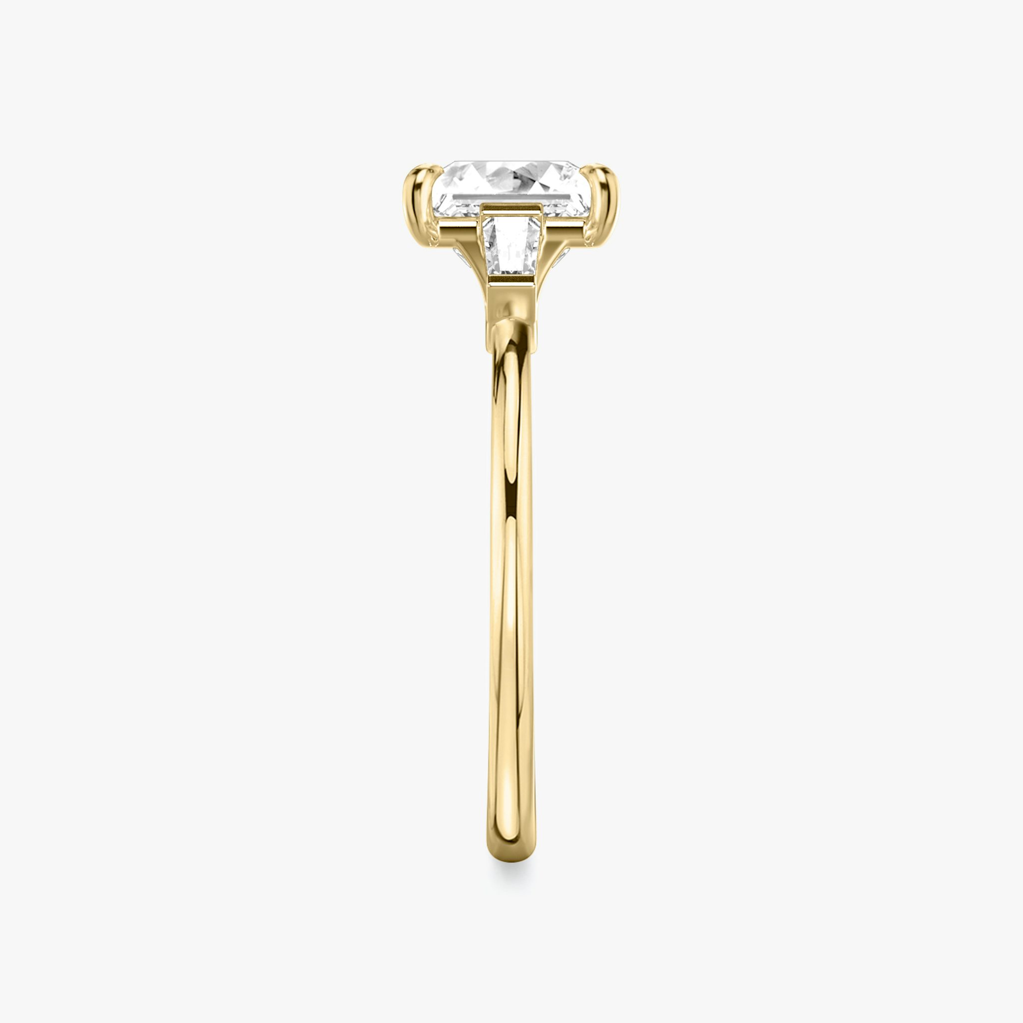 The Three Stone | Princess | 18k | Yellow Gold | bandAccent: Plain | sideStoneCarat: 0.10ct | sideStoneShape: Tapered Baguette | diamondOrientation: vertical | caratWeight: other