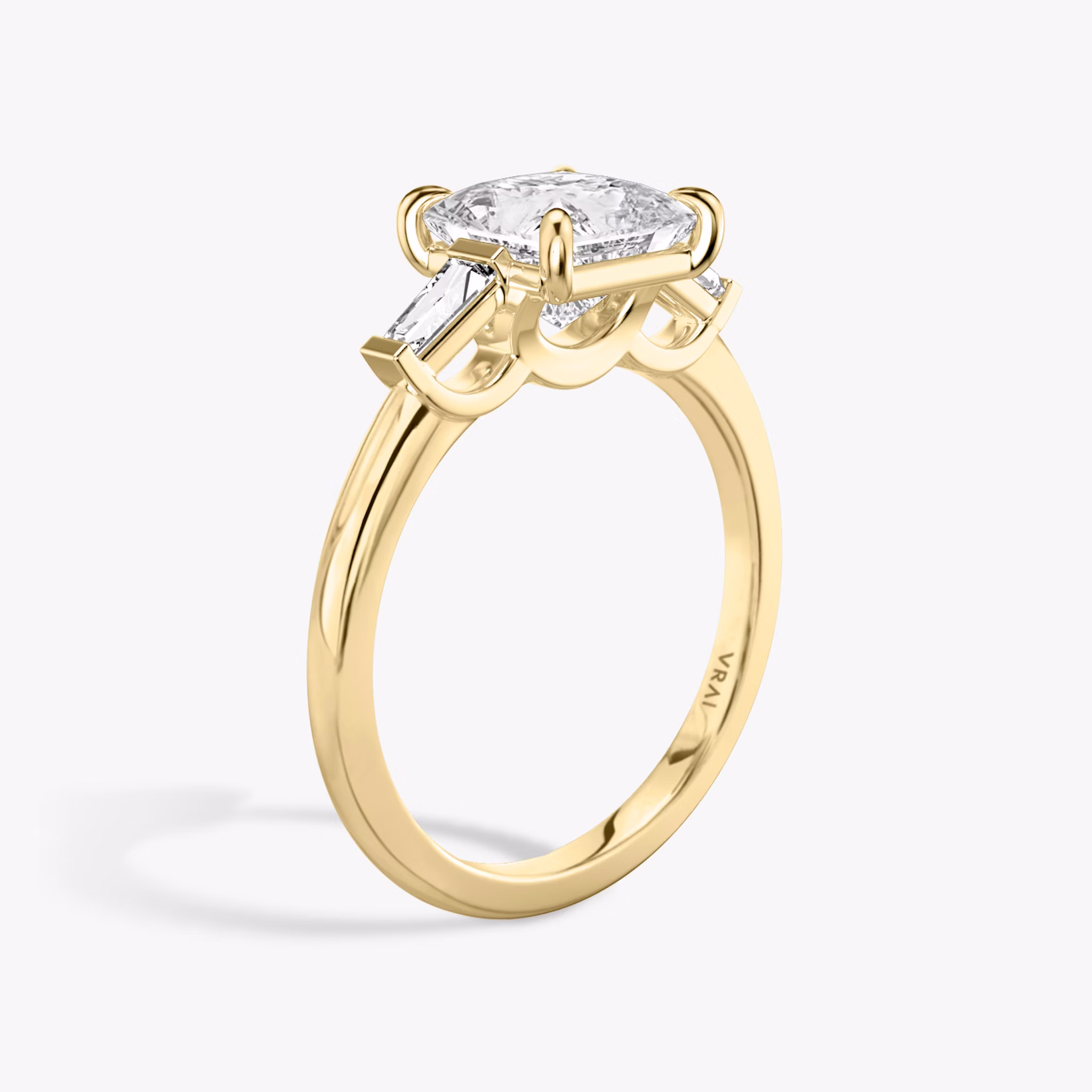 The Three Stone | Princess | 18k | Yellow Gold | bandAccent: Plain | sideStoneCarat: 0.10ct | sideStoneShape: Tapered Baguette | diamondOrientation: vertical | caratWeight: other