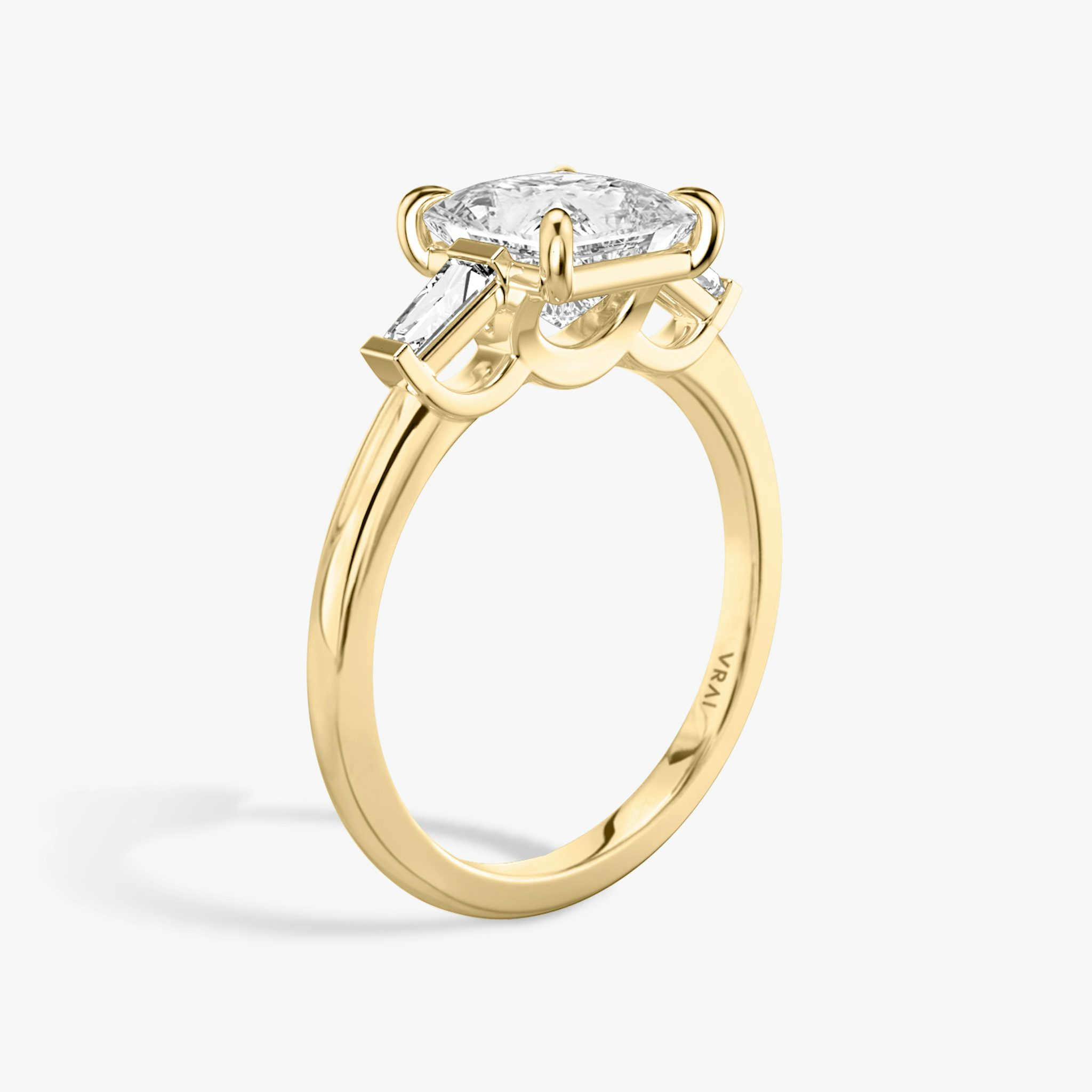 The Three Stone | Princess | 18k | Yellow Gold | bandAccent: Plain | sideStoneCarat: 0.10ct | sideStoneShape: Tapered Baguette | diamondOrientation: vertical | caratWeight: other