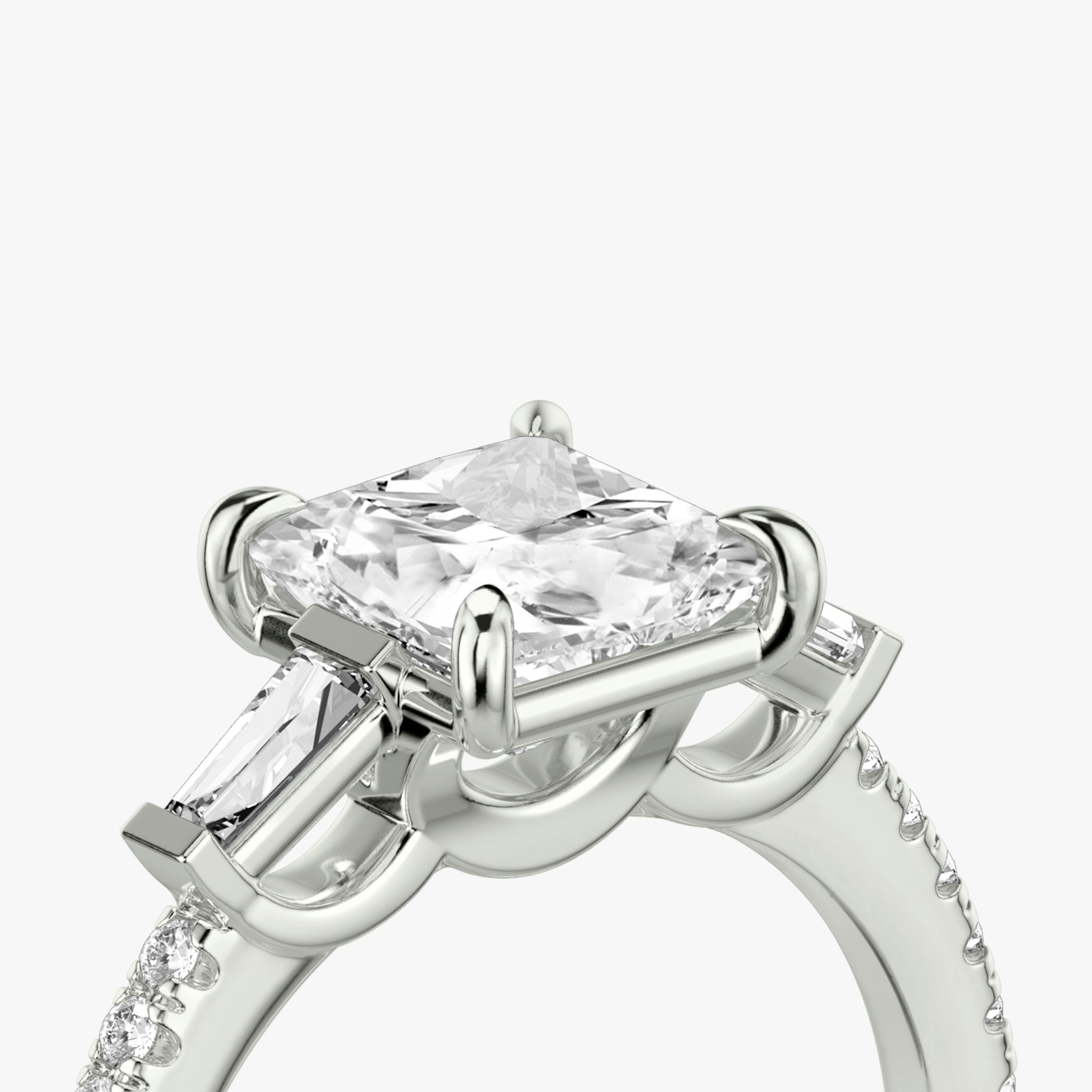 The Three Stone | Princess | Platinum | bandAccent: Pavé | sideStoneCarat: 0.10ct | sideStoneShape: Tapered Baguette | diamondOrientation: vertical | caratWeight: other