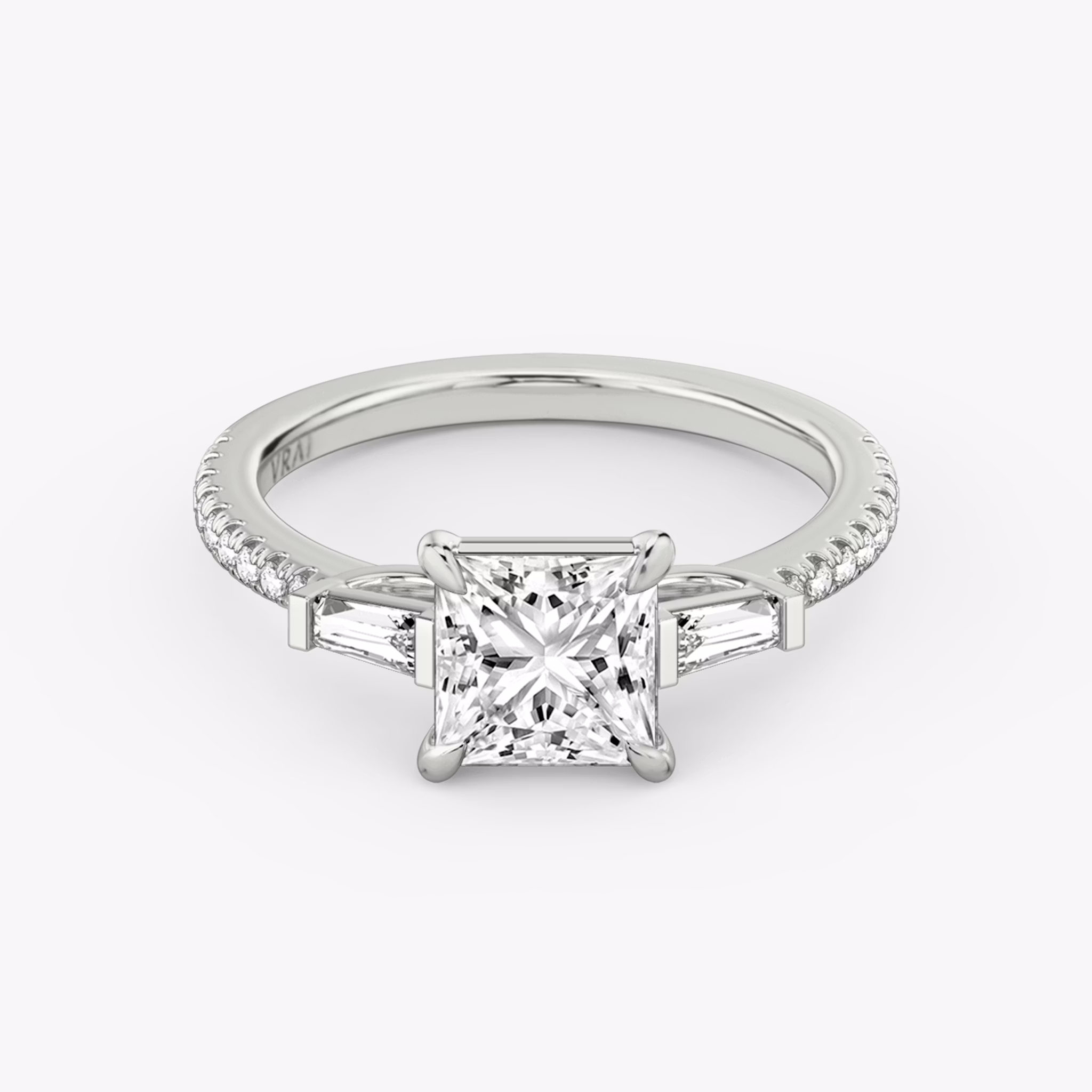 The Three Stone | Princess | Platinum | bandAccent: Pavé | sideStoneCarat: 0.10ct | sideStoneShape: Tapered Baguette | diamondOrientation: vertical | caratWeight: other
