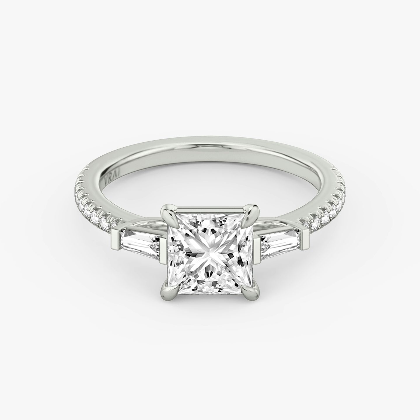 The Three Stone | Princess | Platinum | bandAccent: Pavé | sideStoneCarat: 0.10ct | sideStoneShape: Tapered Baguette | diamondOrientation: vertical | caratWeight: other